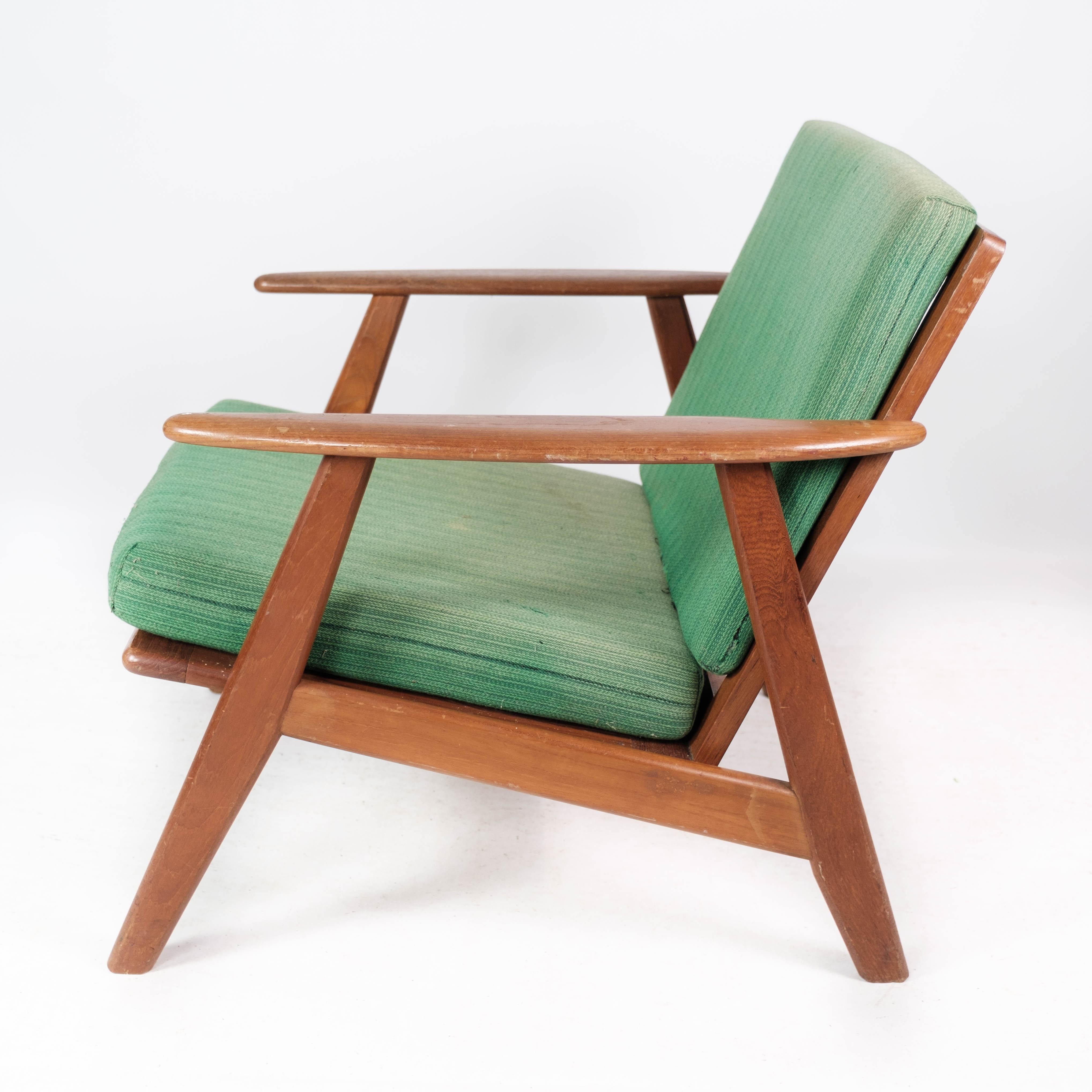 Sessel aus Teakholz und mit grüner Polsterung im dänischen Design der 1960er Jahre (Dänisch) im Angebot