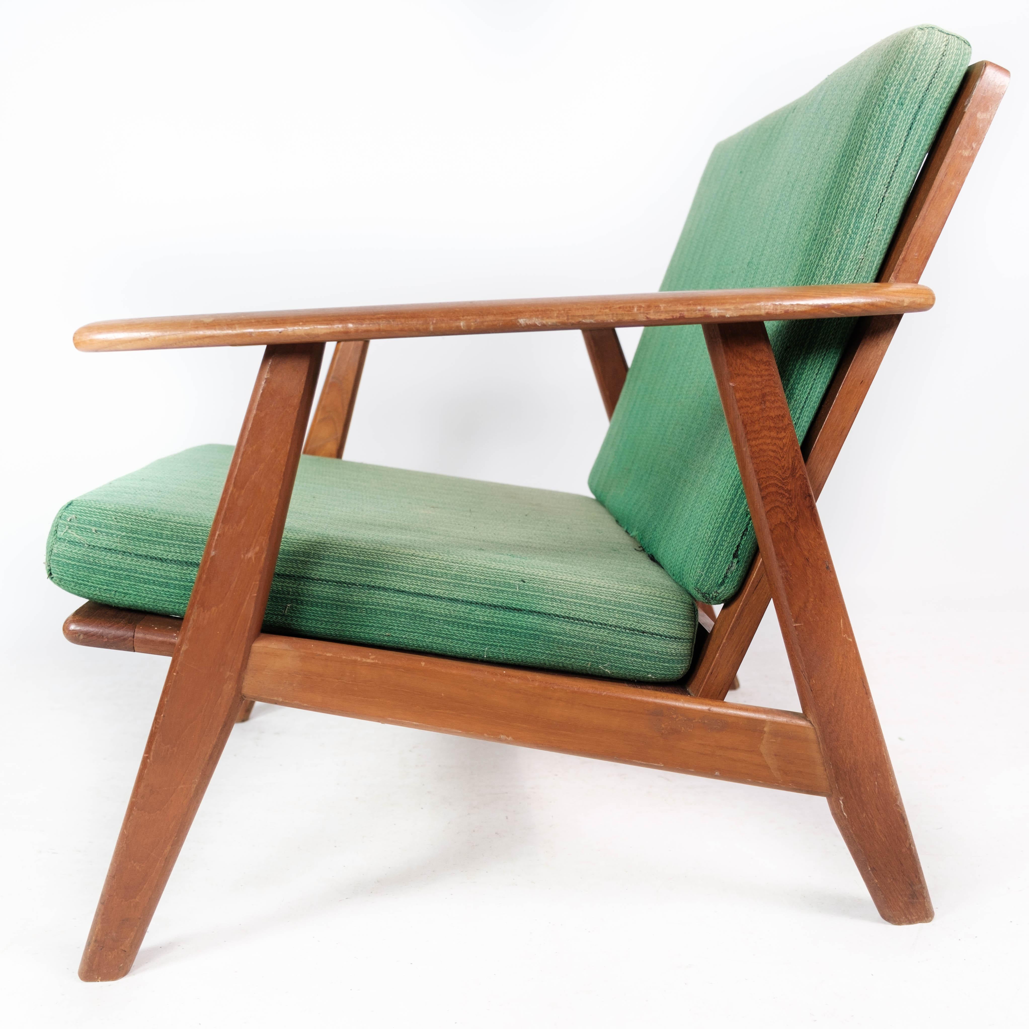Sessel aus Teakholz und mit grüner Polsterung im dänischen Design der 1960er Jahre im Angebot 1