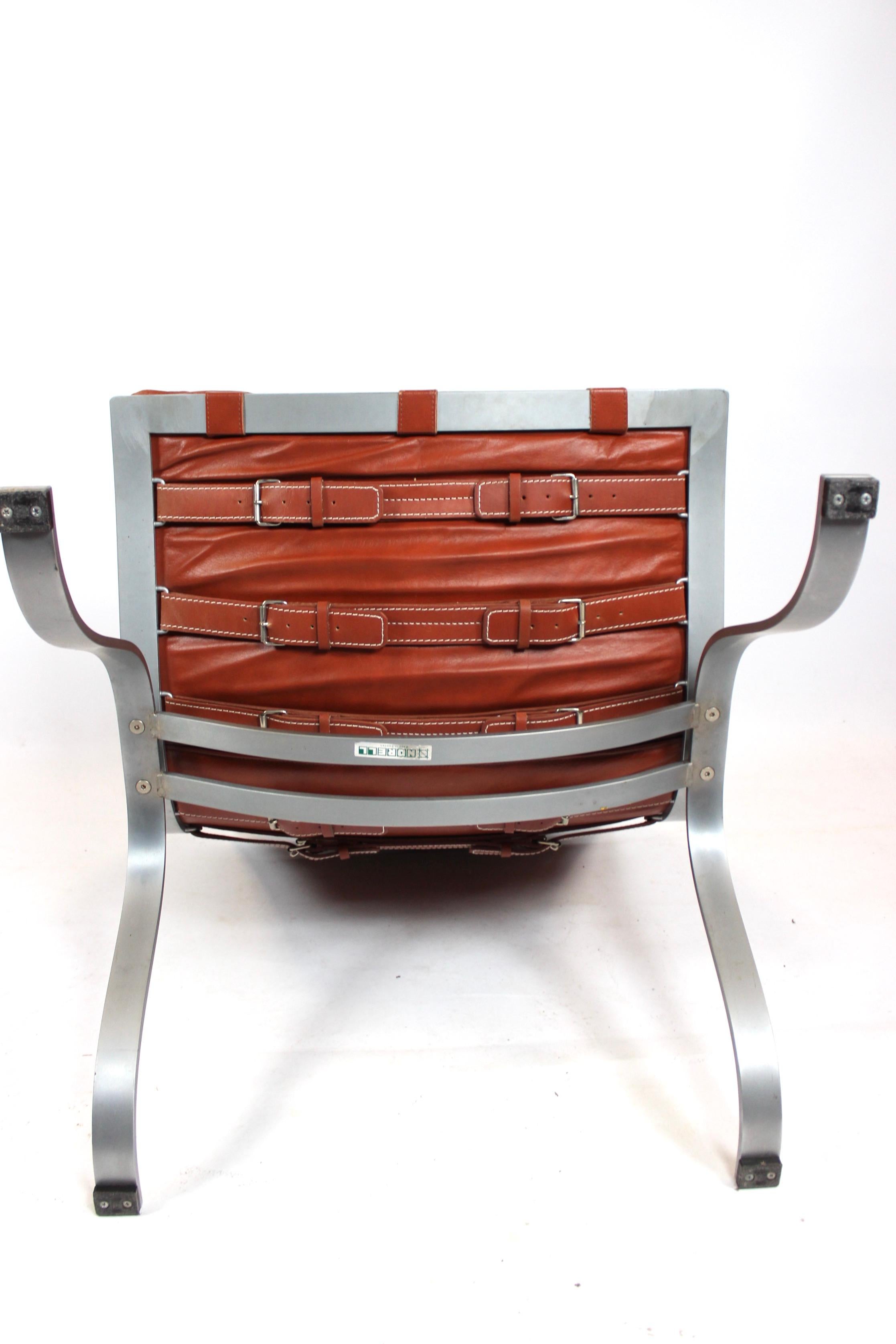 Metal Easy Chair, Model Ariet, of Red Leather and Steel Frame Designed by Arne Norell