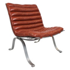 Easy Chair, Model Ariet, of Red Leather and Steel Frame Designed by Arne Norell