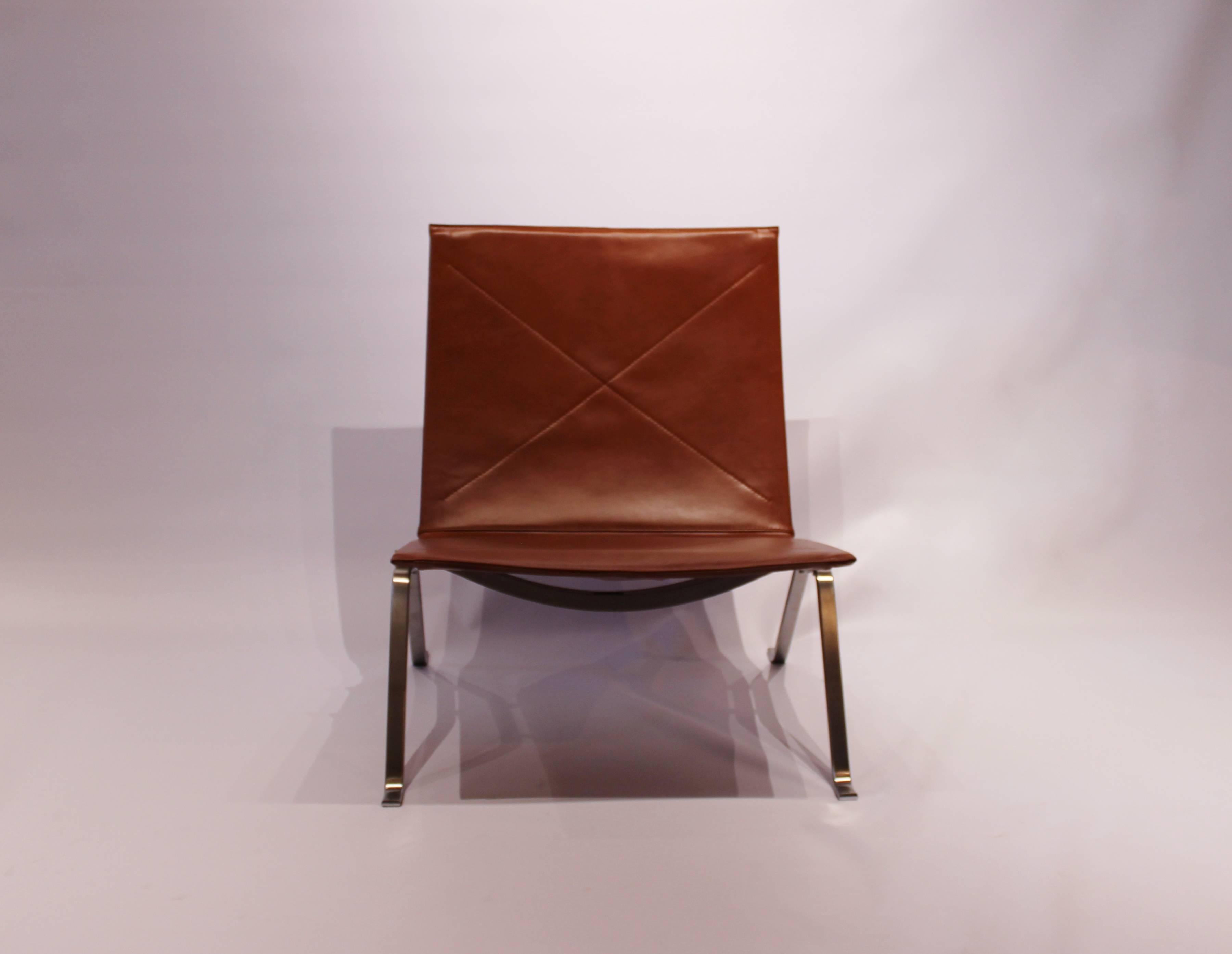 Easy chair, model PK22, designed by Poul Kjærholm and manufactured by Fritz Hansen in 2016. The chair is with cognac colored Classic leather and frame of chrome.