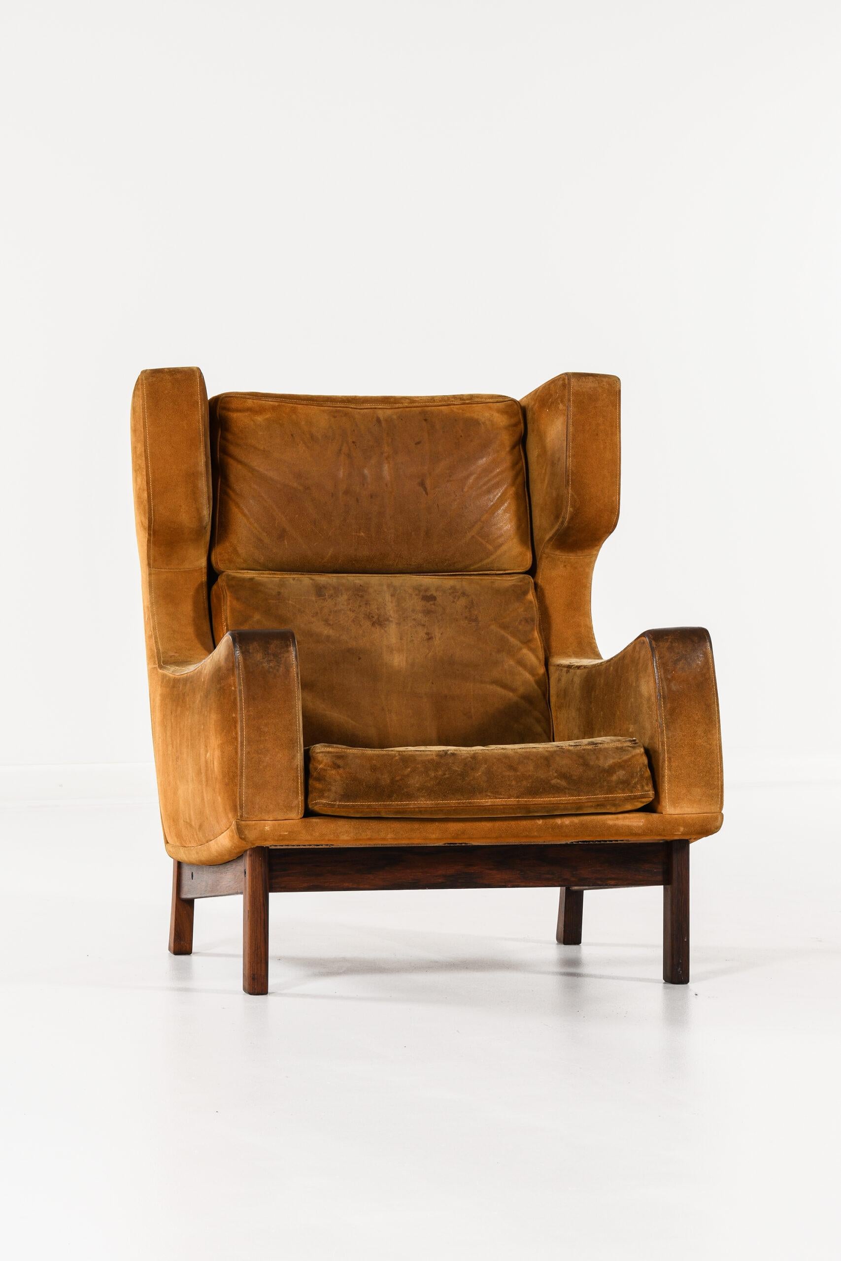 Very rare wingback easy chair by unknown designer. Produced in Denmark.