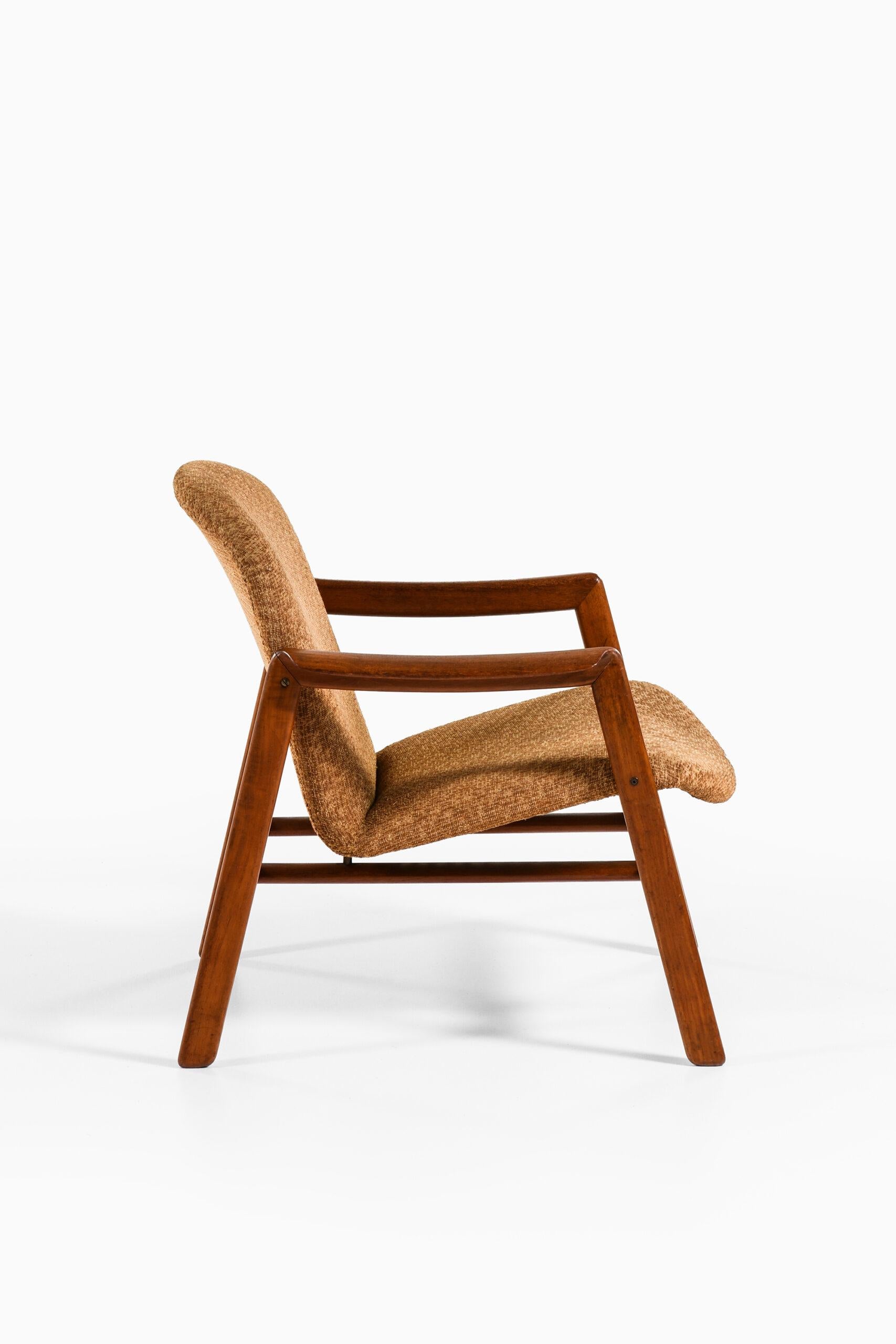 Brass Easy Chair Produced in Denmark For Sale