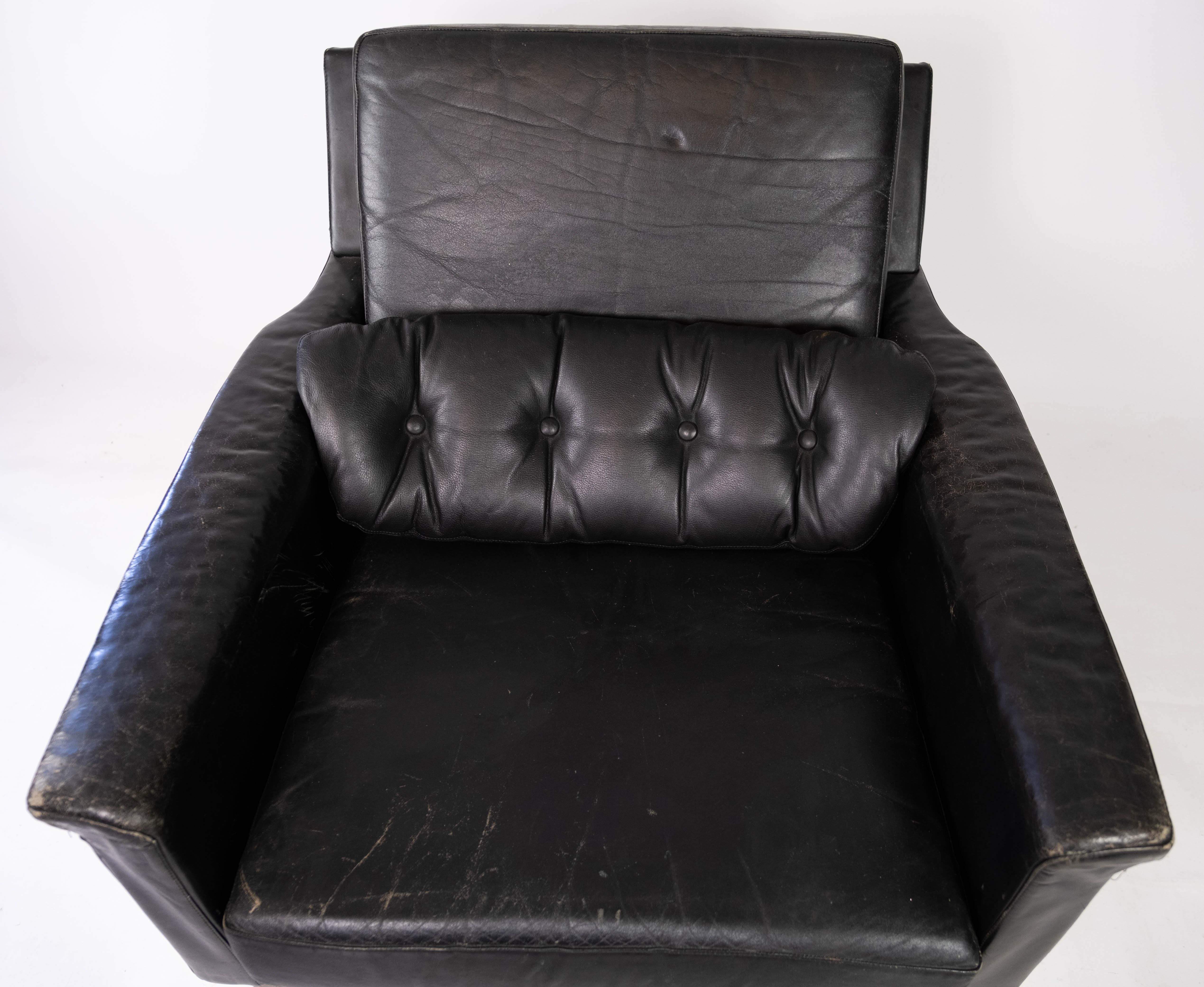 Danish Easy Chair Upholstered with Black Leather and Legs in Wood, by Illum Wikkelsø