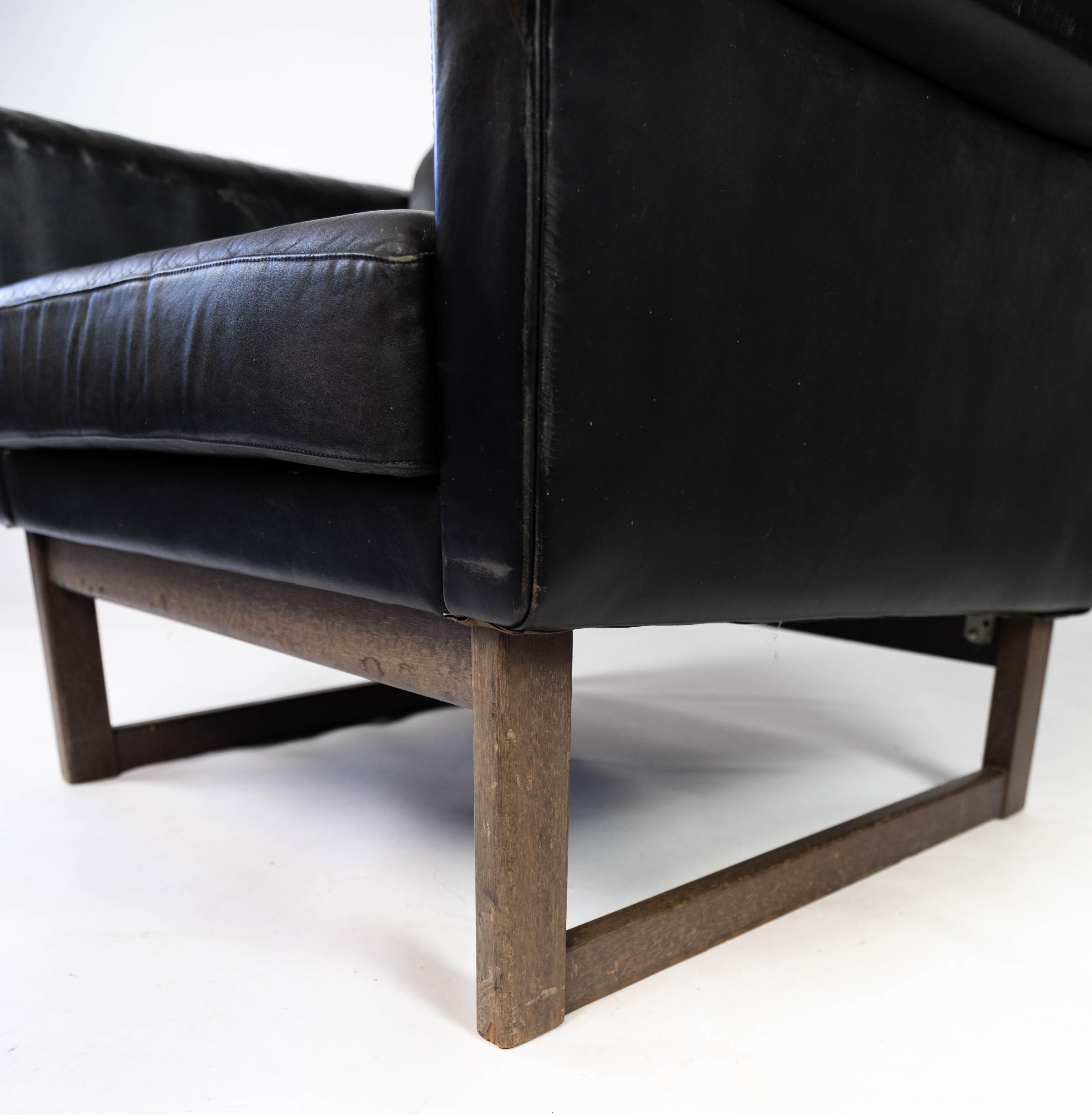 Easy Chair Upholstered with Black Leather and Legs in Wood, by Illum Wikkelsø 2