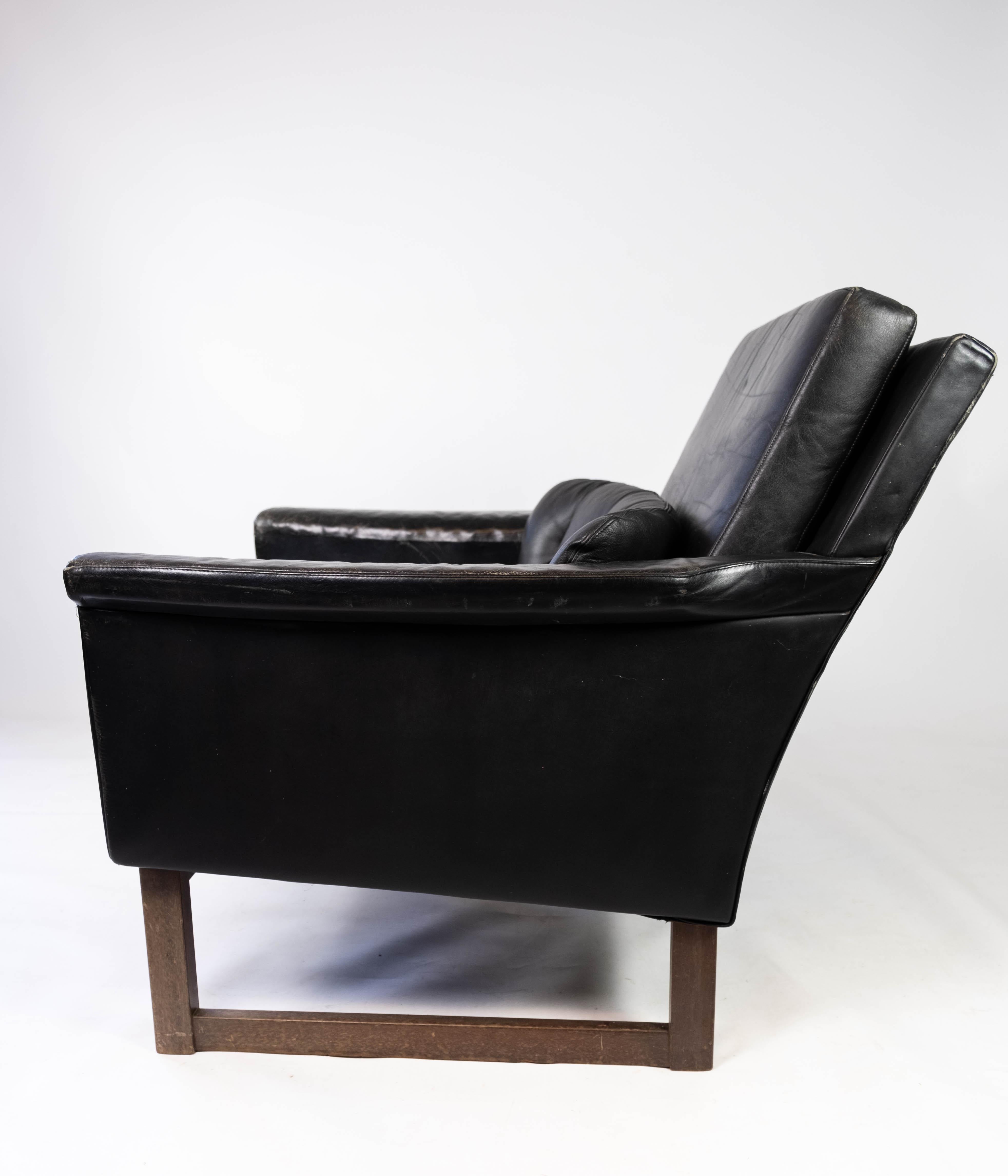 Easy Chair Upholstered with Black Leather and Legs in Wood, by Illum Wikkelsø 3