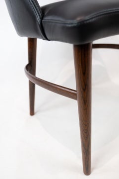Easy Chair, gepolstert mit schwarzem Leder und Beinen aus Palisanderholz, von Chr. Linneberg