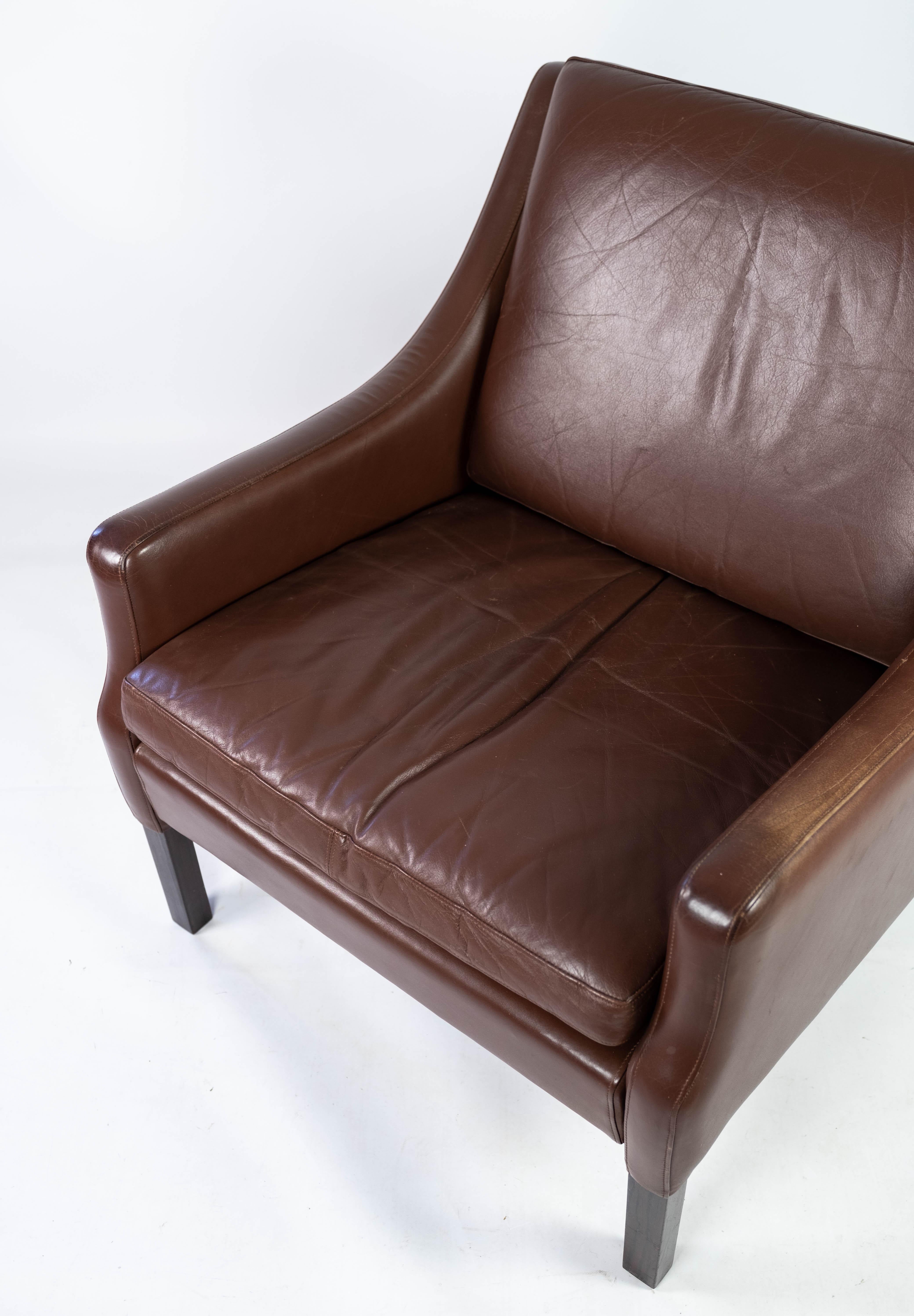 Scandinavian Modern Easy Chair Upholstered with Dark Brown Leather Danish Design, 1960s