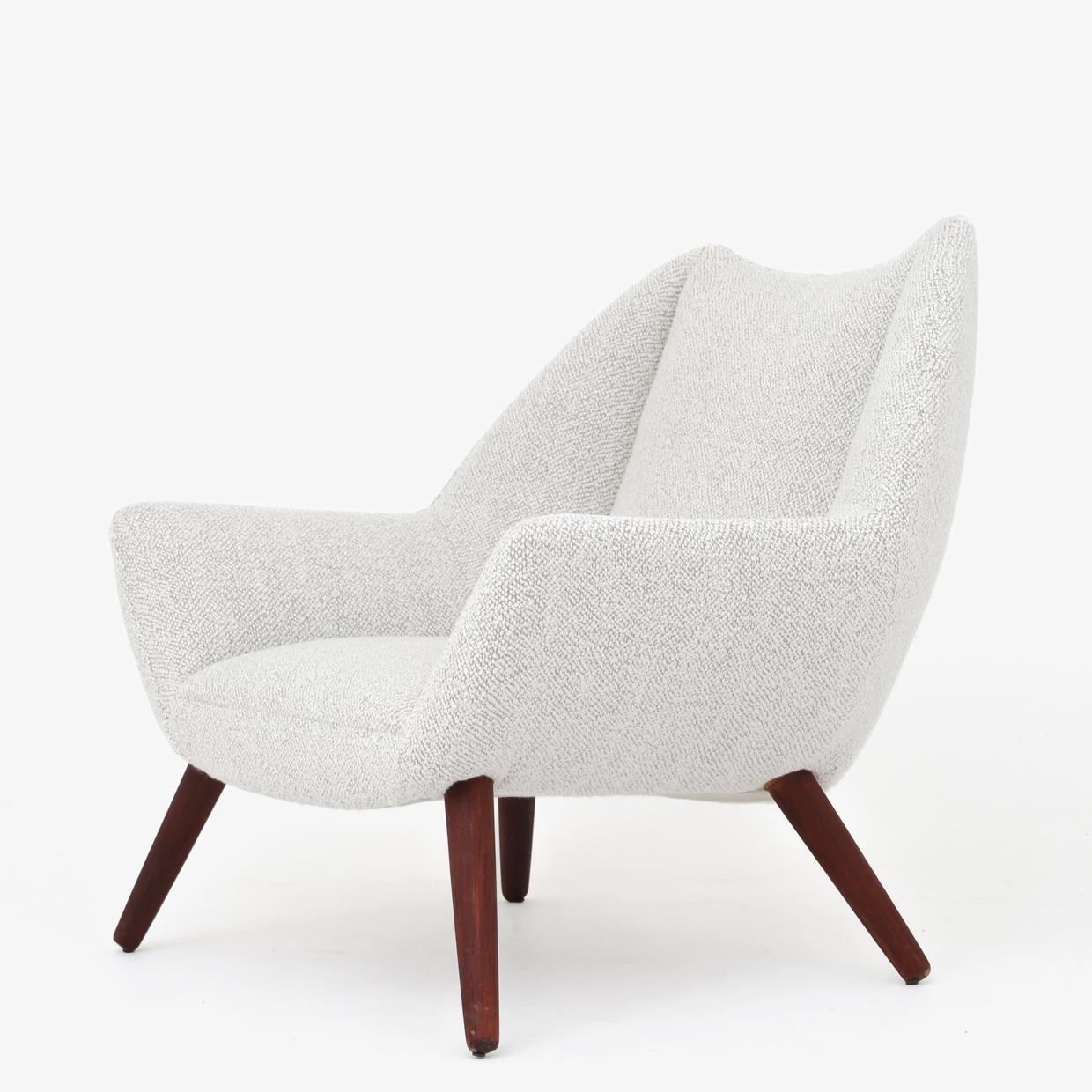 Model 12 - Reupholstered easy chair with matching stool with legs in teak and upholstery in light textile (Bridget Meringue 001). Designed in 1961. Maker Schillers Polstermøbelfabrik.