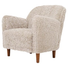 Easy chair with lamb's wool by unknown maker