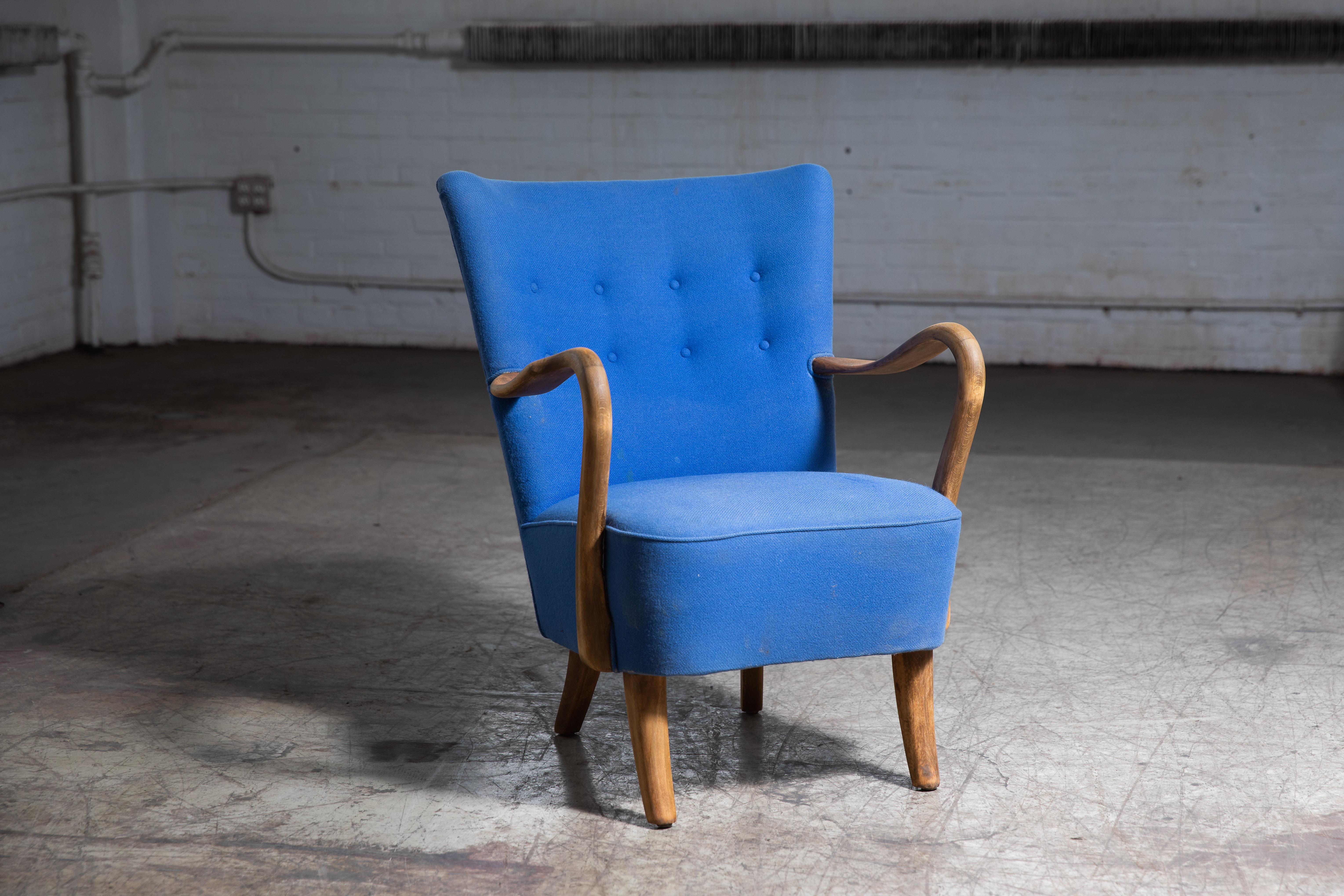 Classic elegant Danish high back armchair from the 1940s by Alfred Christensen for Slagelse Mobelvaerk with open armrests in beautifully curved mahogany stained beech. Nice slim elegant sculptural silhouette. Solid and sturdy construction and the
