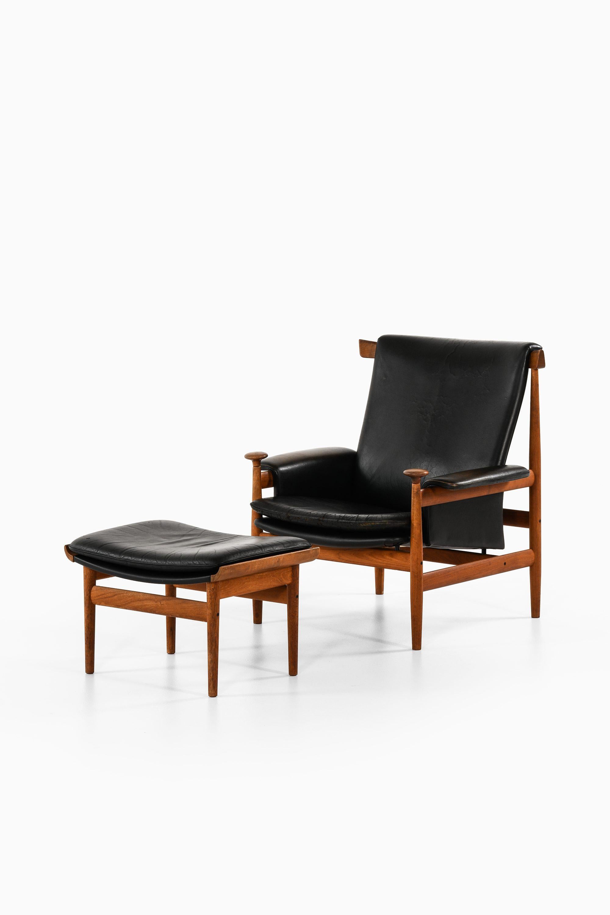 Easy Chair with Stool in Teak and Black Leather by Finn Juhl, 1960's

Additional Information:
Material: Teak and black leather
Style: Mid century, Scandinavian
Rare easy chair with stool model Bwana
Produced by France & Daverkosen in
