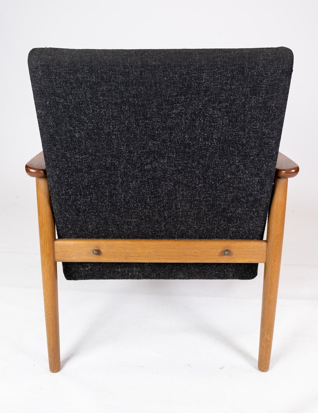 Mid-20th Century Easy Chair With Stool Made In Teak & Dark Wool Fabric From 1960s For Sale