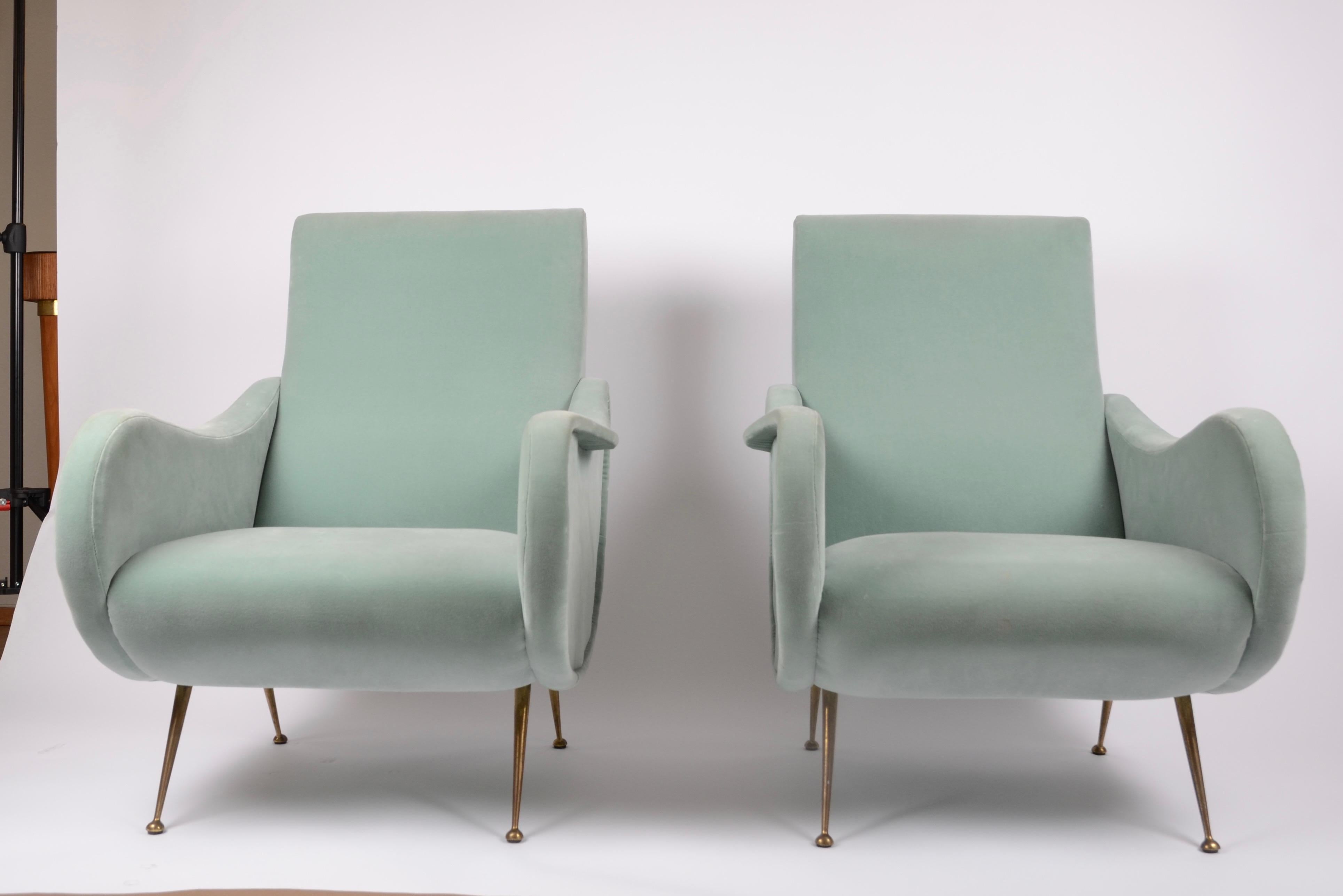 A pair of Italian lounge chairs, mid-1900s.