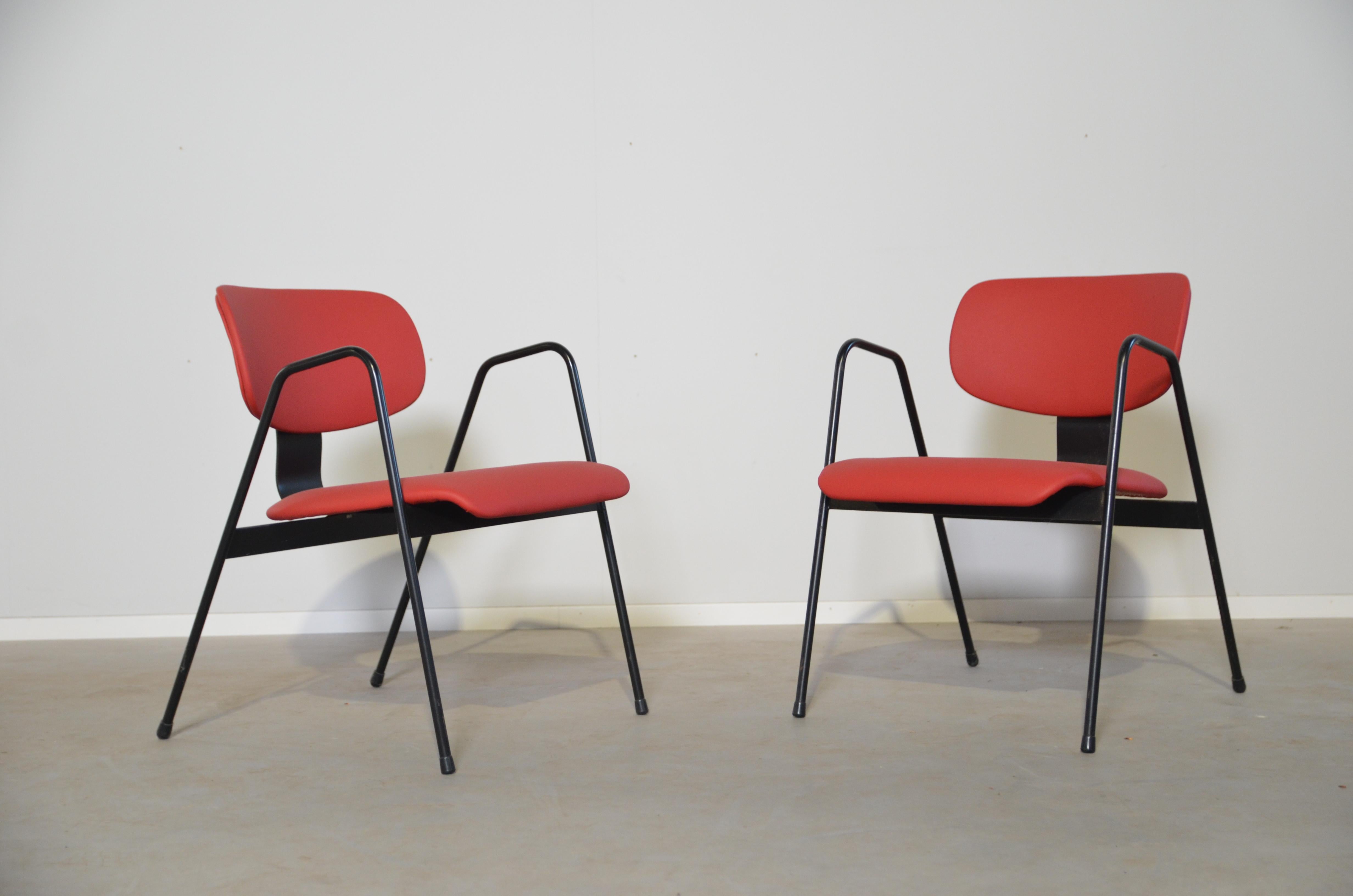 Very comfortable easy chair by Belgium designer Willy van der Meeren for Tubax. Black lacquered steel frame with new red artificial leather seat. There is only ons chair available.