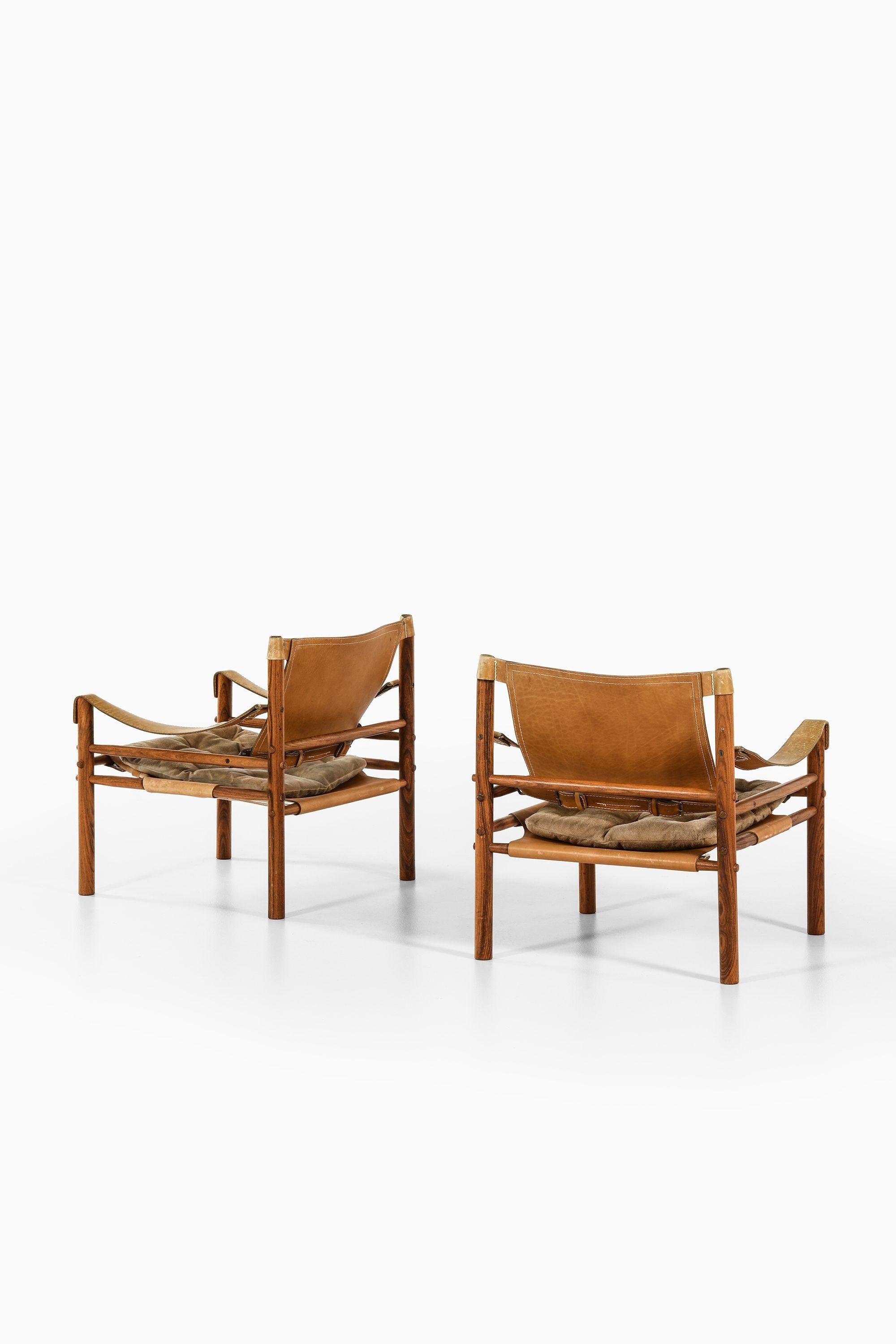 Easy chairs Model Sirocco designed by Arne Norell, 1964

Additional Information:
Material: Rosewood, cognac brown leather and original suede
Style: Midcentury, Scandinavian
Very rare easy chairs model Sirocco
Produced by Arne Norell AB in