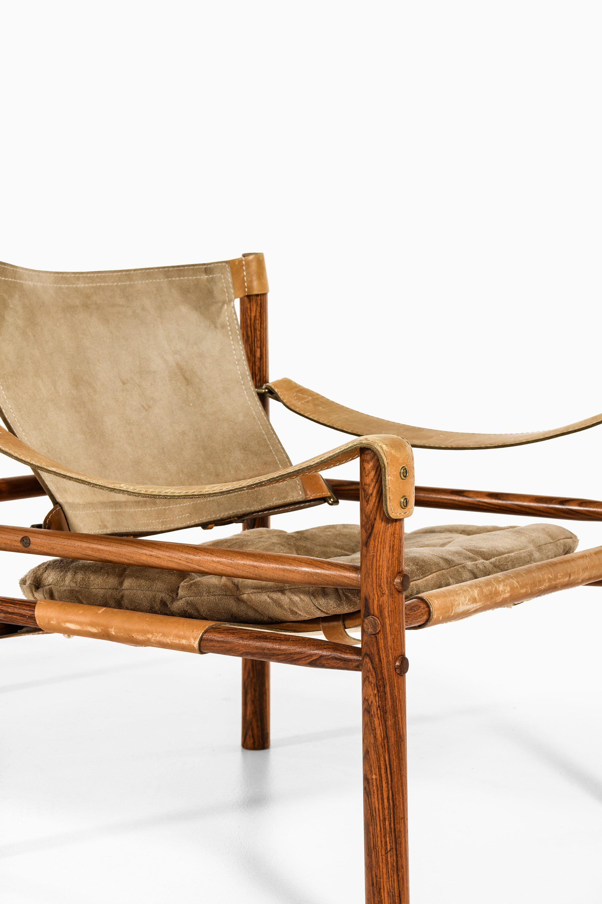 Swedish Easy Chairs in Rosewood, Cognac Leather and Original Suede by Arne Norell, 1964