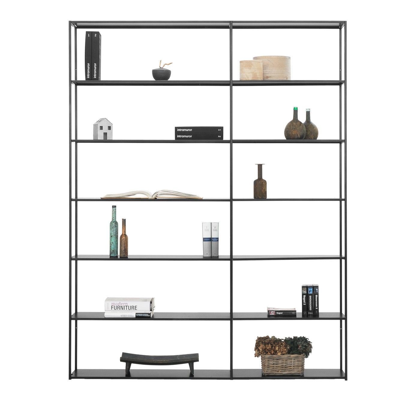 Modular bookcase that can be disassembled. Uprights in square tubing with metal snap-fit shelves. Shelf length is either 74 or 104 cm. Powder coated in black or white. Clearance between shelves is 36 cm. Securing to the wall is recommended.