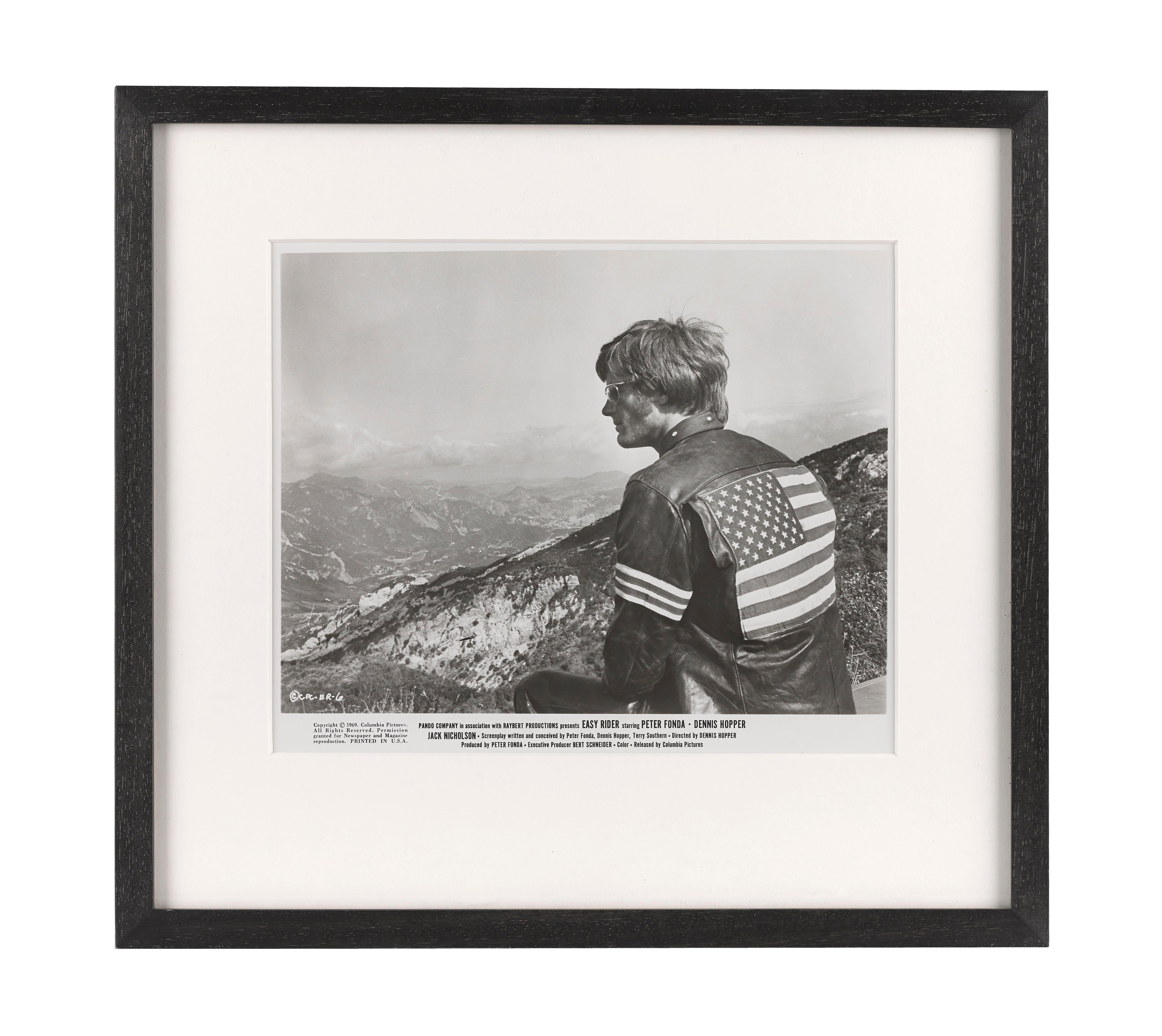 Fotogramma originale della produzione del road movie Easy Rider del 1969.
Questo film è stato diretto da Dennis Hopper e interpretato da Peter Fonda, Dennis Hopper e Jack Nicholson.
Questo pezzo è incorniciato in una cornice in legno Sapele con