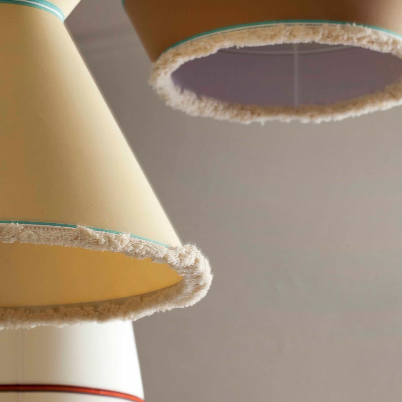 The Easy Roof series is all about plain shapes and uncommon color combinations. The lampshade cotton fabric is presented in block colors with contrasted trimmings and fringing around the bottom rim. Suitable for LED Bulbs Cable. Lampshade Cotton