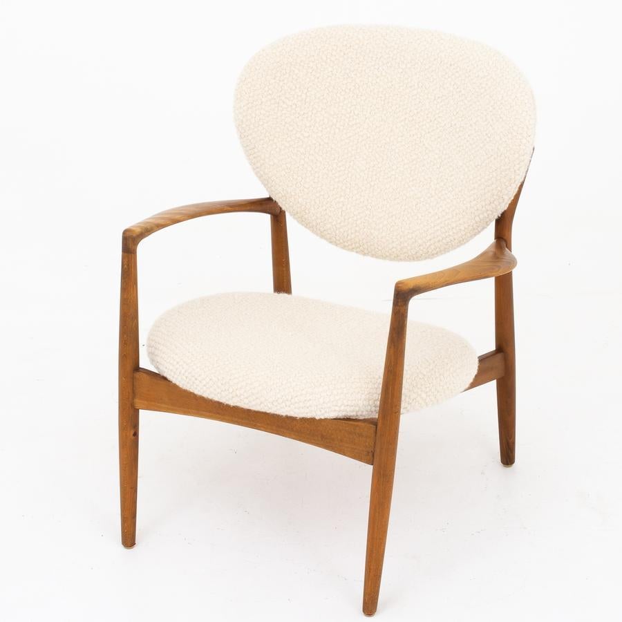 Easy chair in stained beech reupholstered with Hibou - Agnello from Dedar, Italy. Maker Christensen & Larsen.