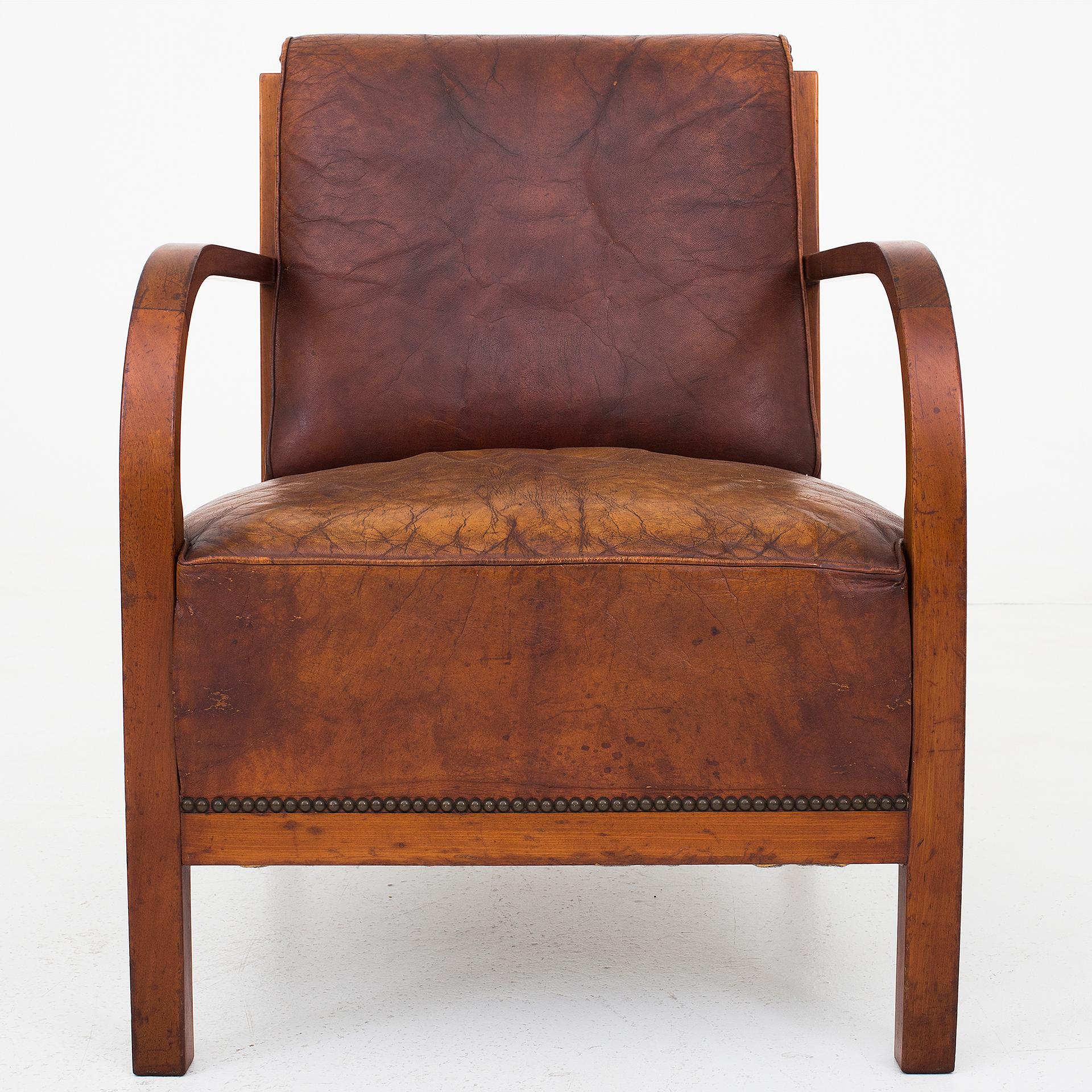 20th Century Easychair in mahogany and patinated Niger leather For Sale