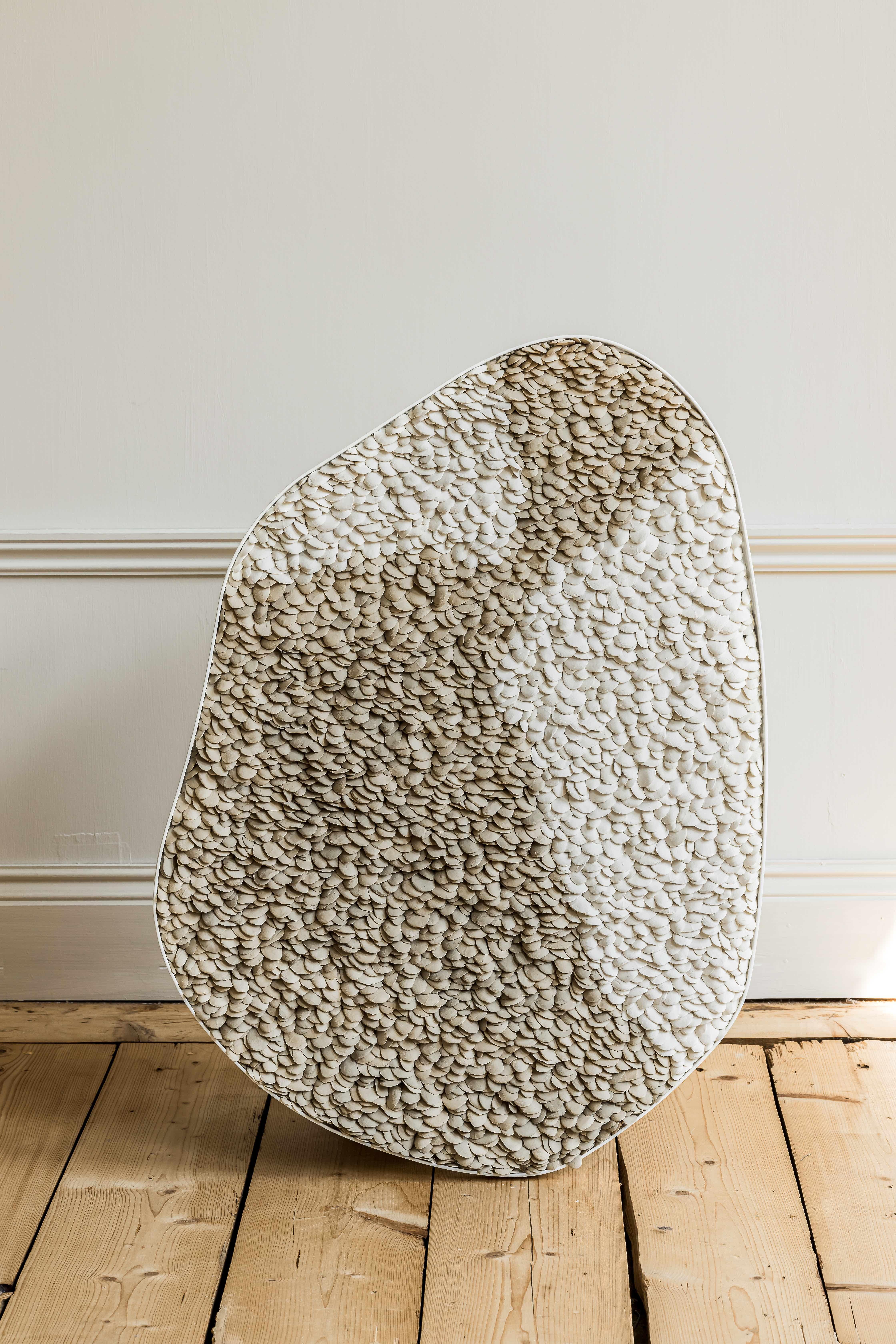 Eatnu rug by Hanna Heino
Dimensions: D 4 x W 59 x H 82 cm
Materials: Handbuilt, Clay, Porcelain, Aluminum.


Hanna Heino is a contemporary clay artist from Finland known for her delicate form language that honours the beauty and subtle nuances