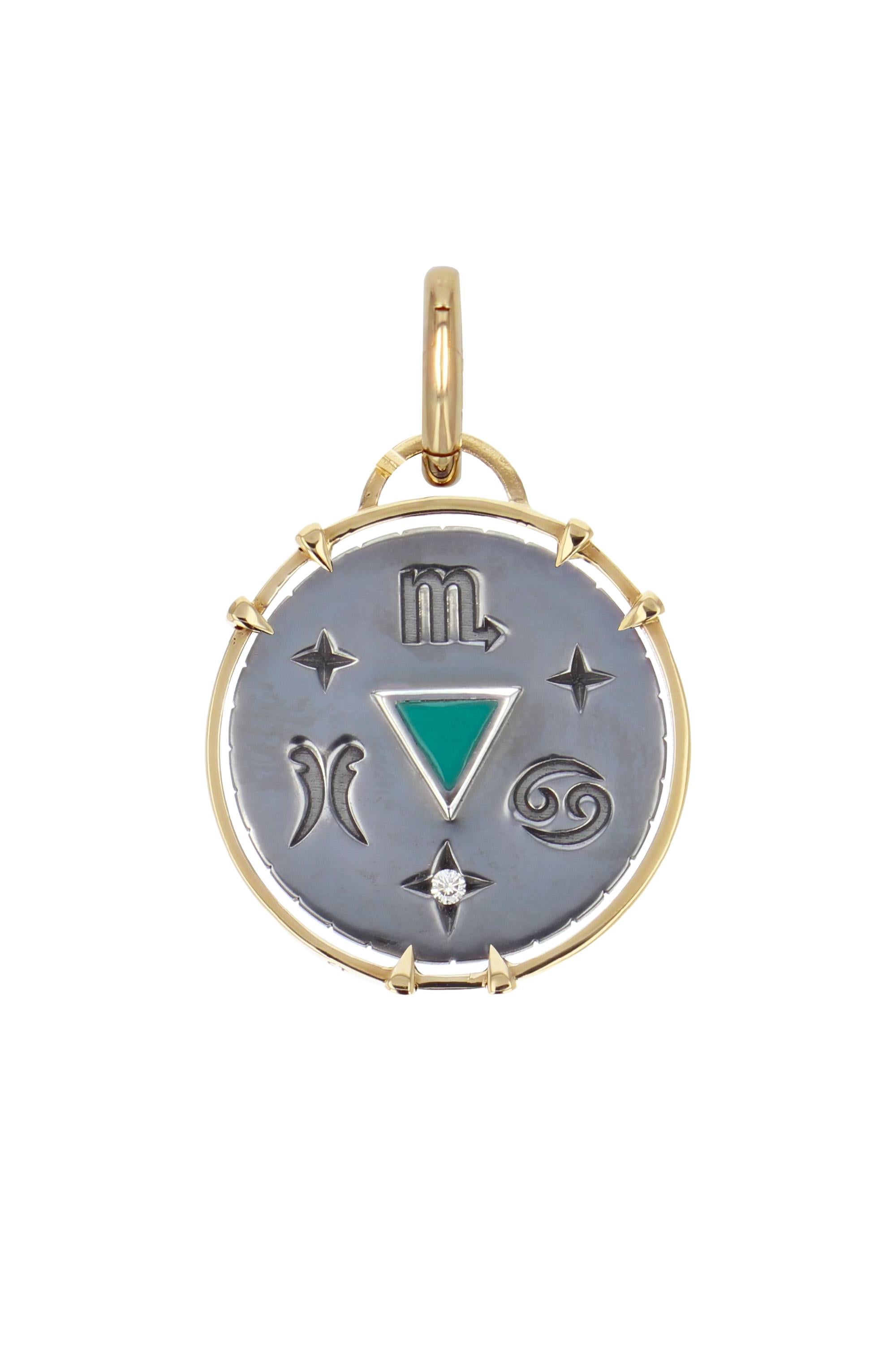 Yellow gold and distressed silver charm. Studded with a diamond, the charm embraces all the symbols linked to the Water sign with a gold heart on its front and the alchemy triangle surrounded by its zodiac signs (Cancer, Scorpio, Pisces) on its