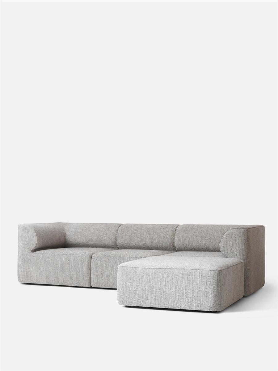 Inspired by architecture Eave Modular sofa takes its name from “eaves”, the lower edges of the roof that overhang a wall. The sofa’s distinctive detail is its internal “eaves”, curved upholstered armrests that lend the sofa its expressive character.