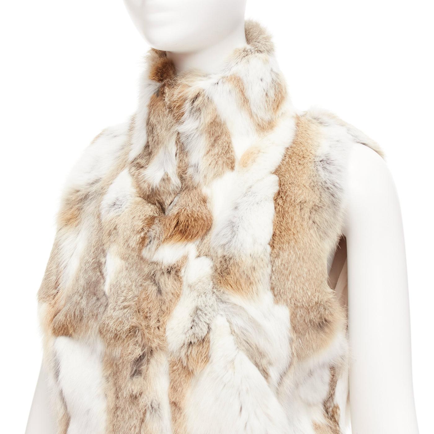 EAVES brown white rabbit fur patchwork hi neck sleeveless vest jacket S
Reference: LACG/A00432
Brand: Eaves
Material: Fur
Color: Brown, White
Pattern: Patchwork
Closure: Hook & Bar
Lining: Beige Fabric
Made in: China

CONDITION:
Condition: Very