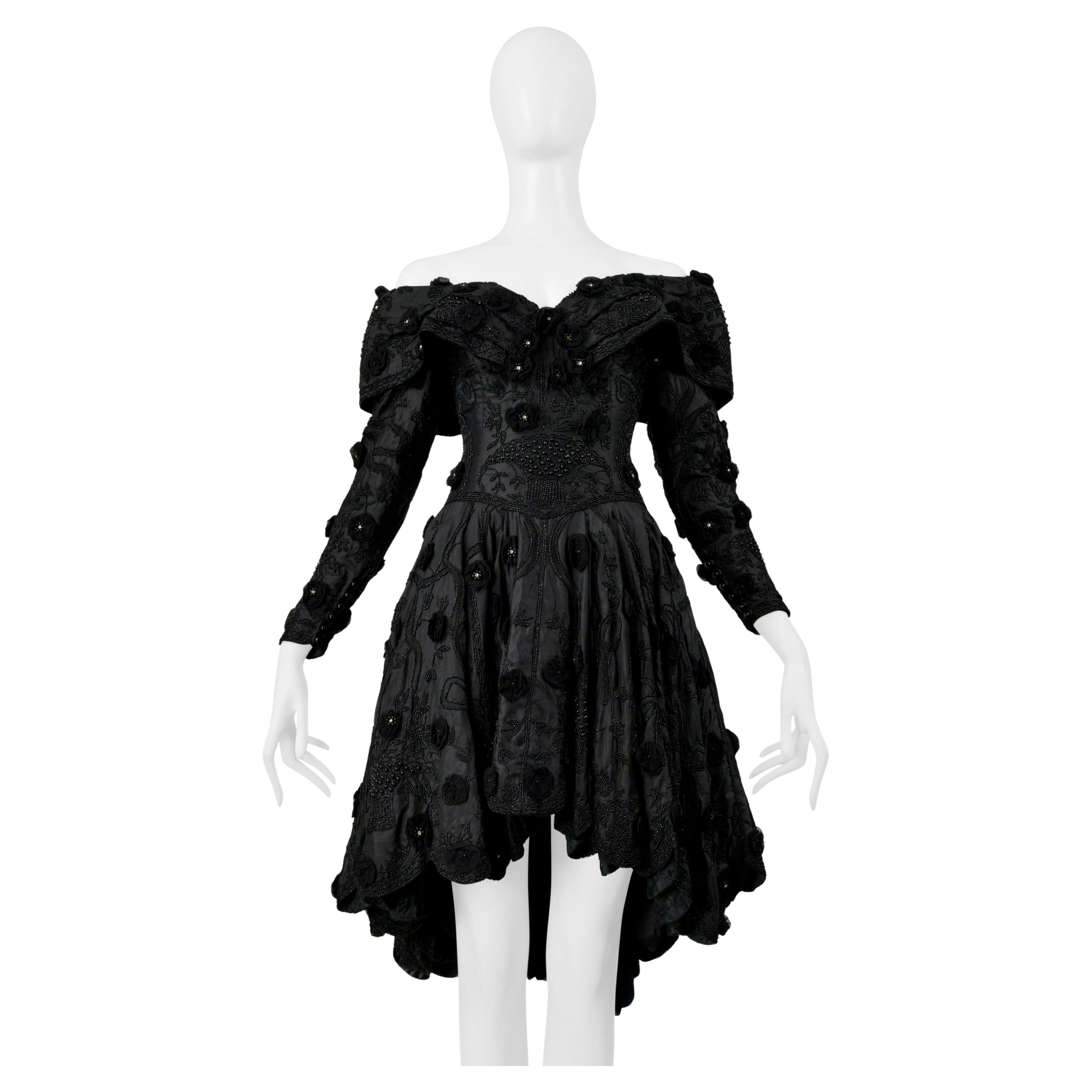 Eavis
Brown Schwarzes perlenbesetztes Cocktailkleid