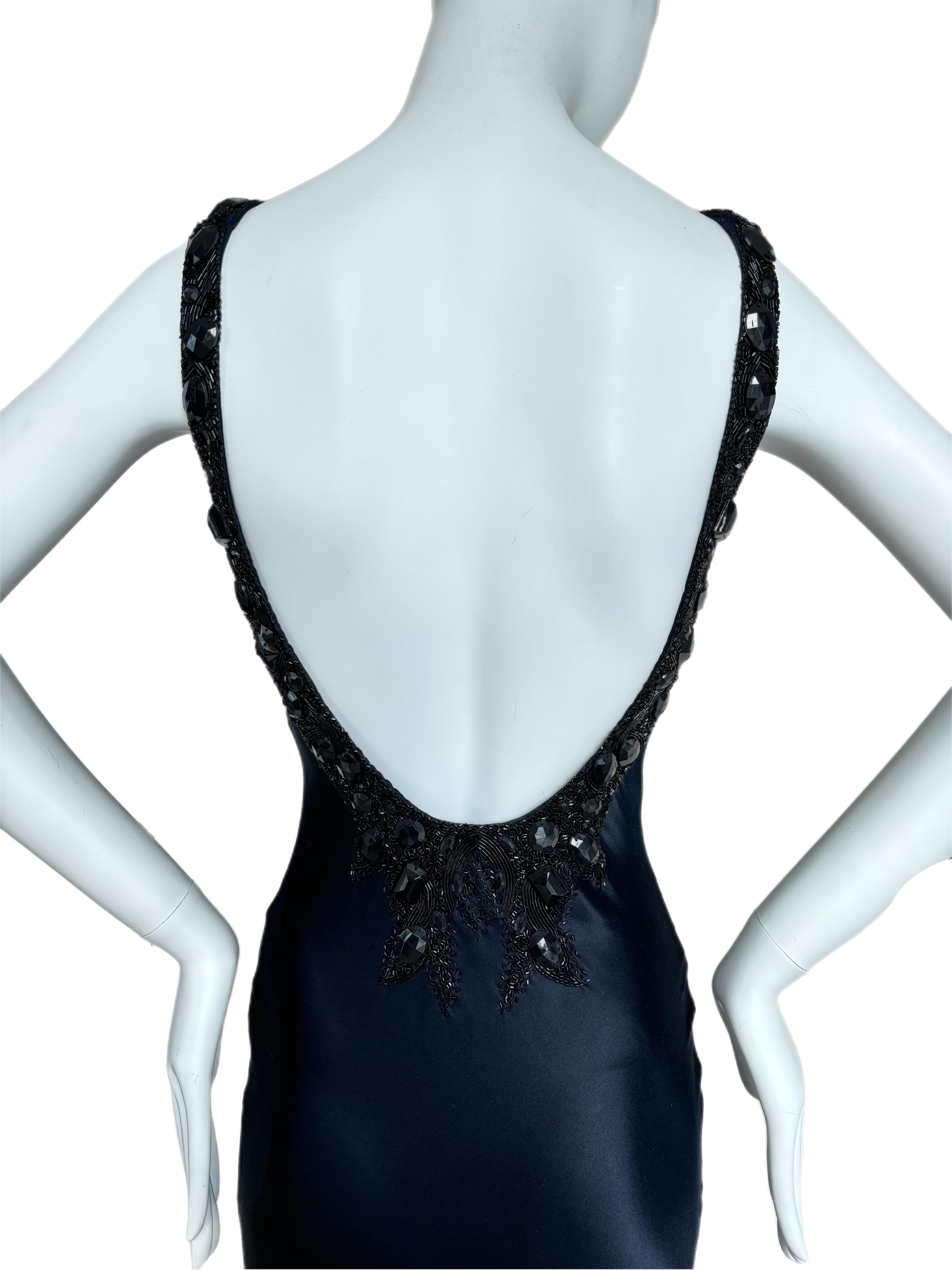 Eavis & Brown Vintage Dark Midnight Navy Blue with Black Embellishments Low back Trumpet skirt style Made in England Size Small Excellent condition, minor feeling of wear. 

Definitely feels like 100% silk, even though it's a very high quality poly.