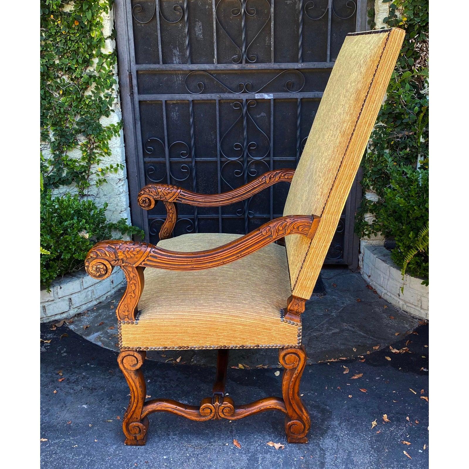 Ebanista Spanish colonial carved walnut throne chairs, a pair.