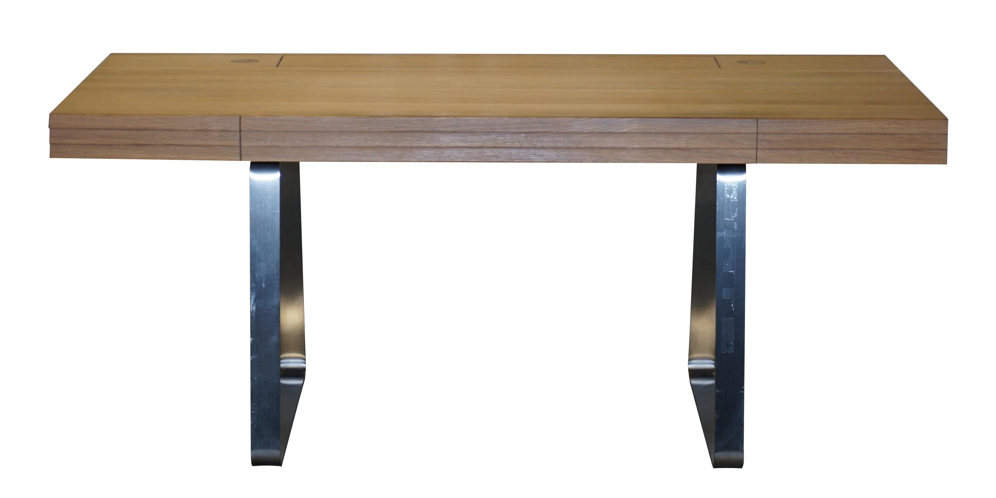 We are delighted to offer for sale this Ebby Gehl office desk retailed through John Lewis in solid oak with chrome base

Made from solid oak, this stunning desk has a smooth and sleek finish. The desk features metallic legs, and opens up to reveal