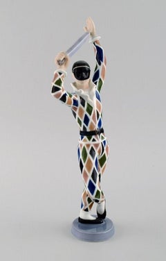Ebbe Sadolin for Bing & Grøndahl. Harlequin porcelain figurine.