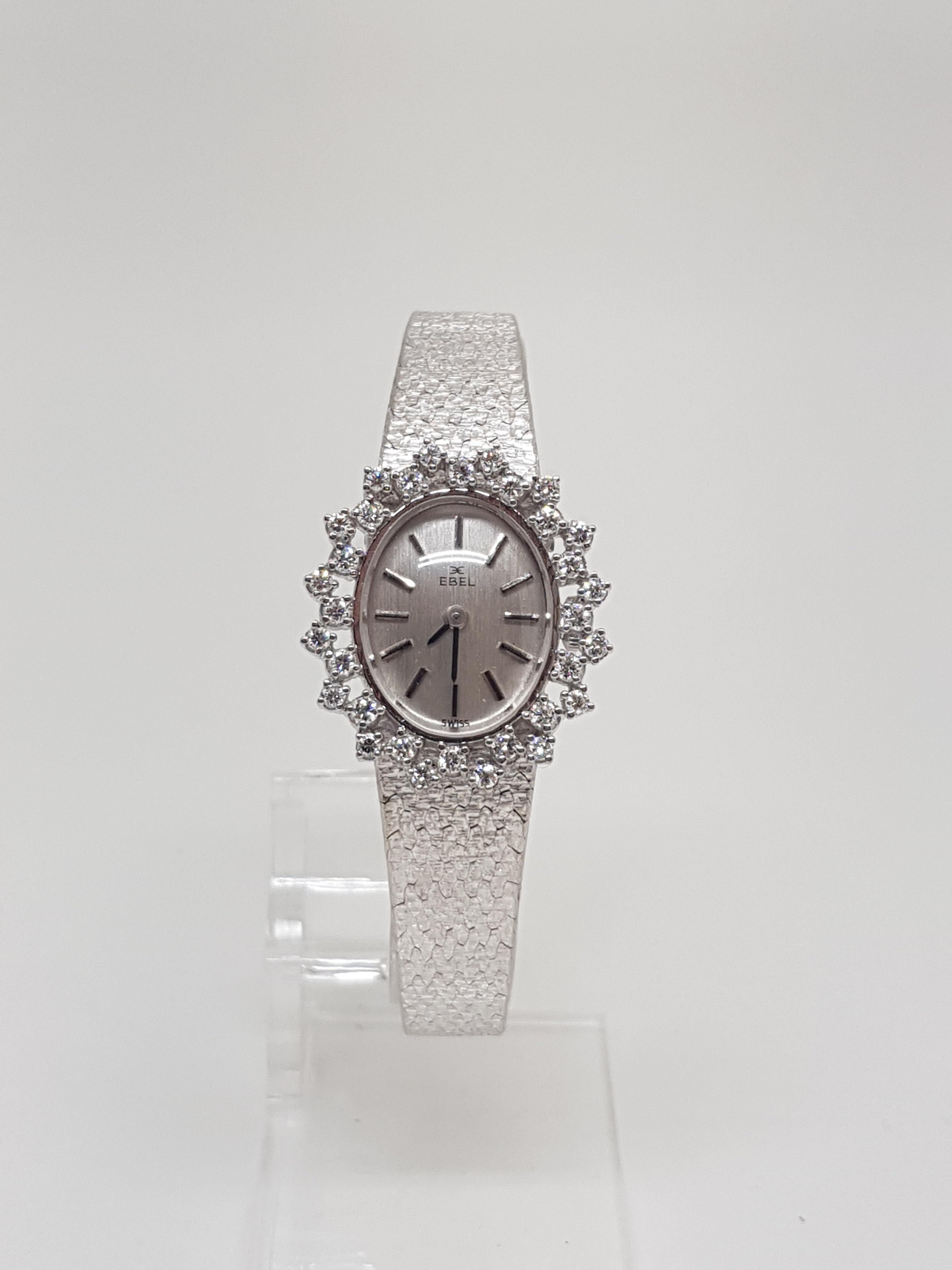Gold: 18 karat white gold. 
Signed Ebel 18K 750 64417 
Diamonds: 0,70ct. colour: D-E-F clarity: VVS 
Vintage 
Mechanical Movement 
Weight: 40,52 gr. 
Diameter with Crown: 21,4mm 
Length: 17,5 cm. 
Signature Ebel Clasp 
All of our jewellery is