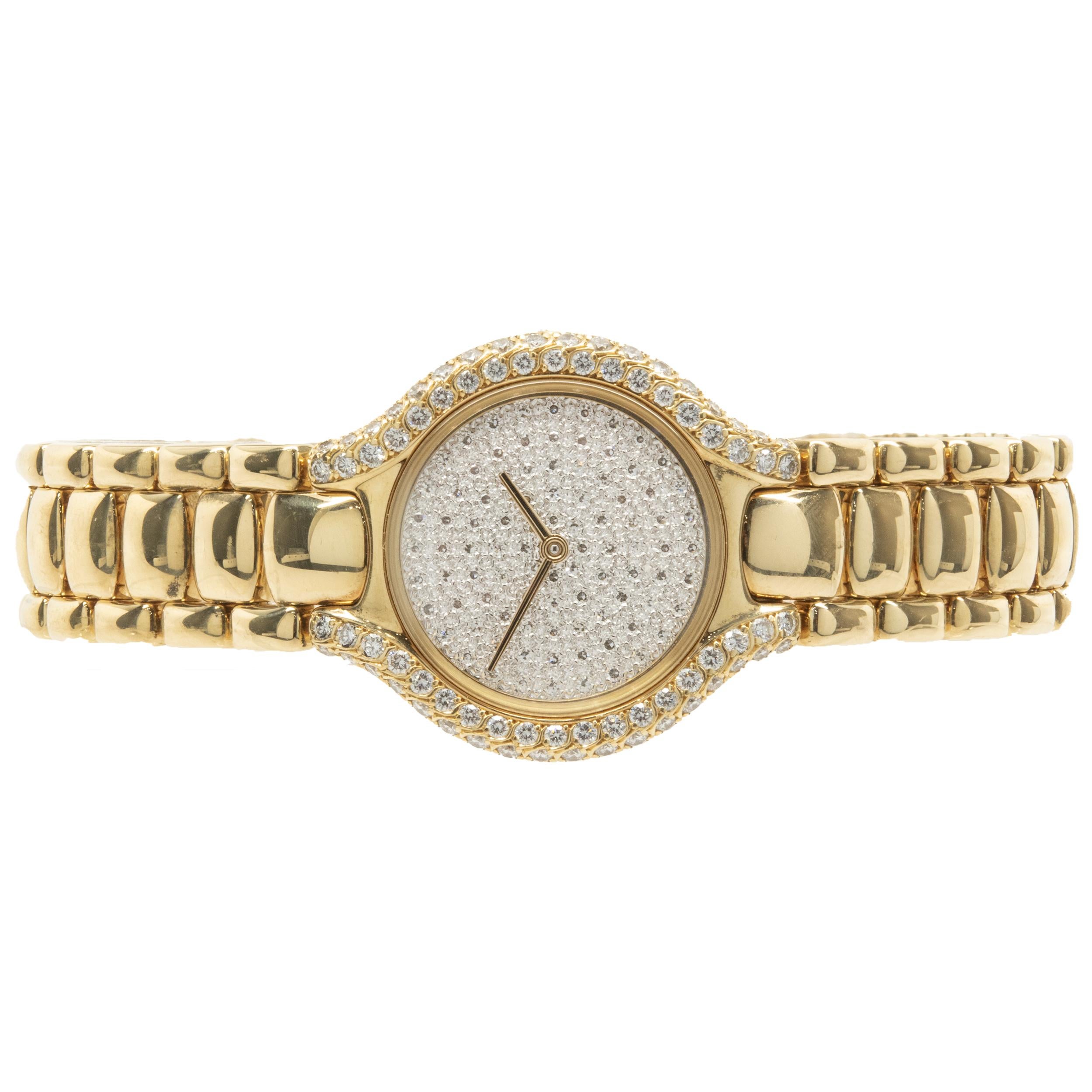 Movement: quartz
Function: hours, minutes
Case: 24mm 18K yellow gold round case, pave diamond bezel 
Band: Ebel 18K yellow gold beluga link
Dial: pave diamond dial
Serial: 42116XXX
Reference: 866969

No box or papers included
Guaranteed to be