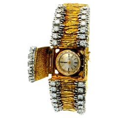 Ebel Orologio da donna rivestito in oro giallo 18 carati con finitura a pepita e diamante laterale da 3 carati