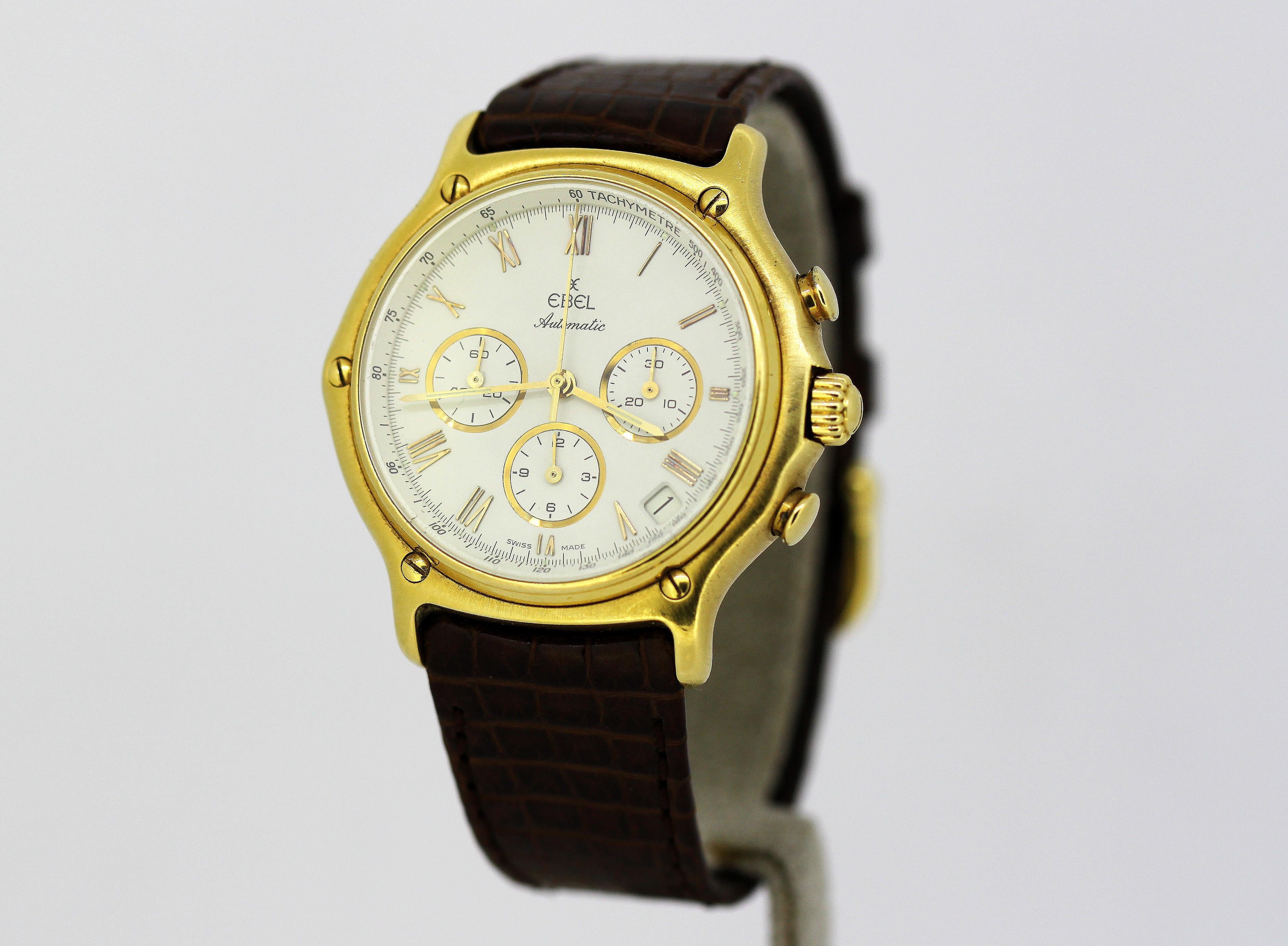 Ebel 1911 Men's Chronograph watch in 18kt gold, Circa 1990's
Comes with full set, including boxes, manual & tags.

Gender: Men's
Case Diameter : 38 mm
Movement: Automatic
Watchband Material: Leather
Case material: 18kt gold
Display