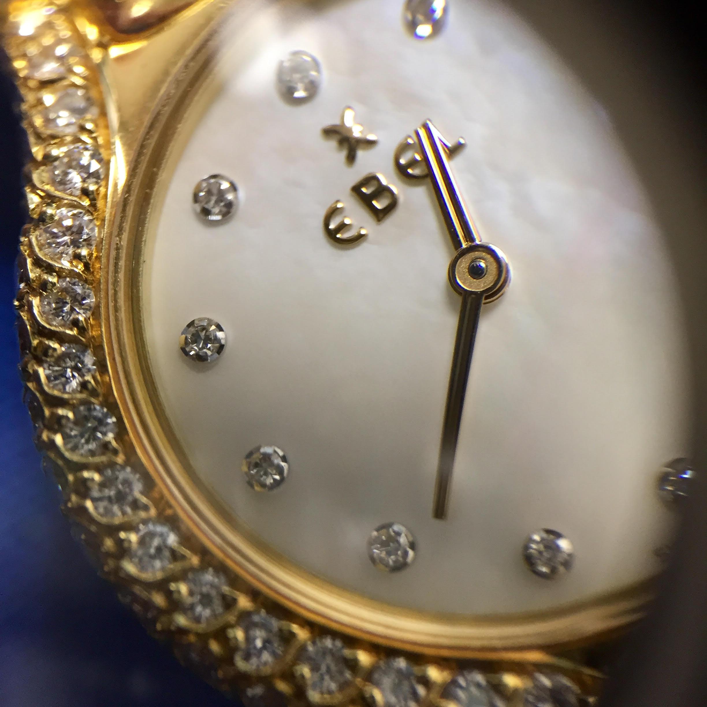  Ebel Beluga Montre à quartz en or jaune 18 carats avec lunette en diamants Pour femmes 