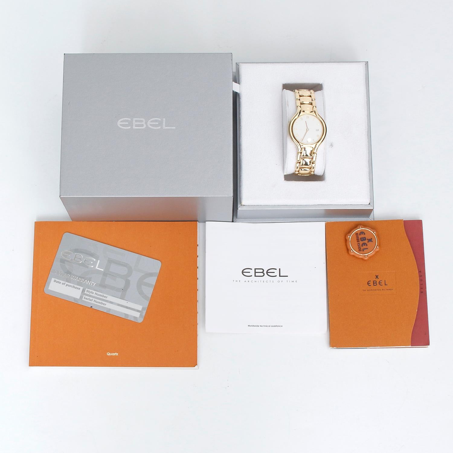 Ebel Beluga 18k Yellow Gold Men's/Ladies 32mm Midsize Quartz Watch 884960 - Quartz movement. 18k yellow gold case (32mm diameter). Ivory colored dial with gold Roman numerals; date at 3 o'clock position. 18k yellow gold bracelet; will fit a 6 1/2