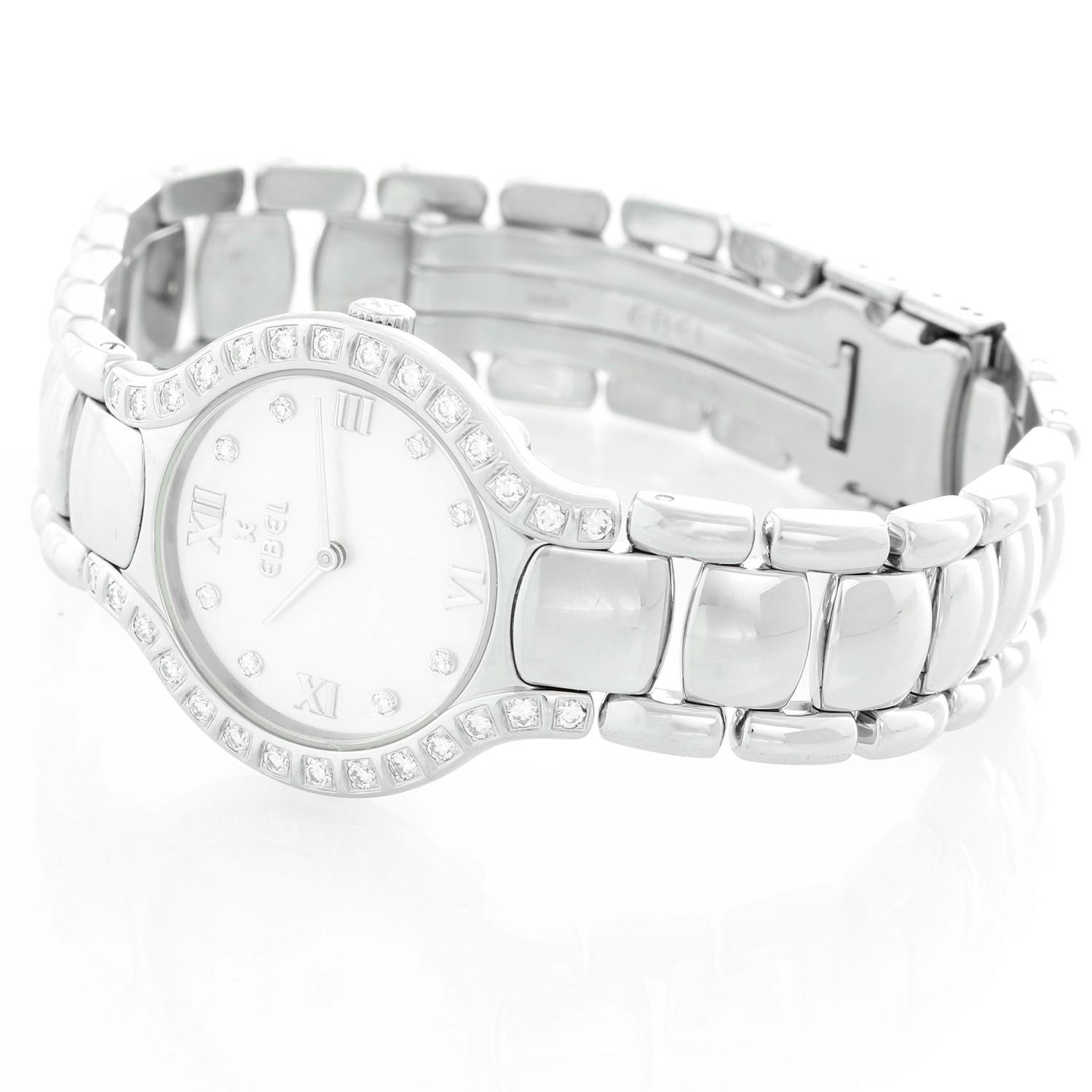 Ebel Beluga Mother of Pearl Diamond Dial Steel Ladies Watch  9157428-20 - Quartz. Stainless steel case with diamonds (27mm diameter). Silver mother of pearl dial with 8 diamond hour markers. Stainless steel Beluga bracelet; will fit a 6 1/2 inch