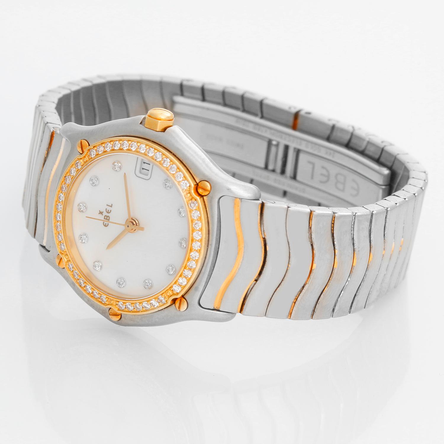 Ebel Beluga Stainless Steel & Diamond Wave Ladies Watch - Quartz movement. Stainless steel case with diamond bezel (26mm diameter). Mother of pearl dial diamond hour markers. Stainless steel bracelet (will fit apx. 5 3/4-inch wrist). Pre-owned with
