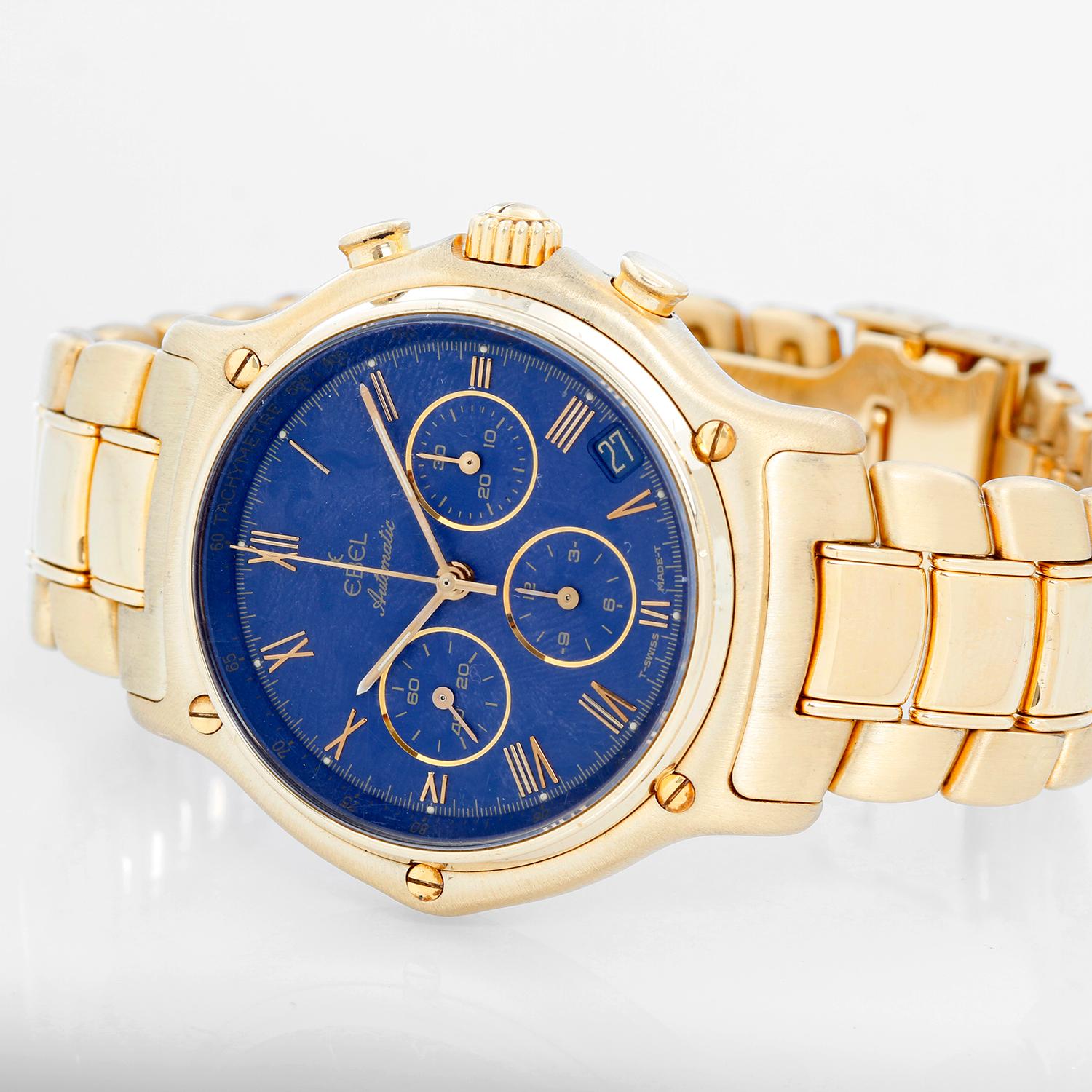 Ebel Chronograph 1911 Men's 18k Yellow Gold Automatic Watch - Automatic winding with date. 18k yellow gold case (38 mm). Blue dial with gold Arabic numerals, 3 blue sub-dials; date between 4 & 5 o'clock. 18k yellow gold Ebel bracelet. Pre-owned with