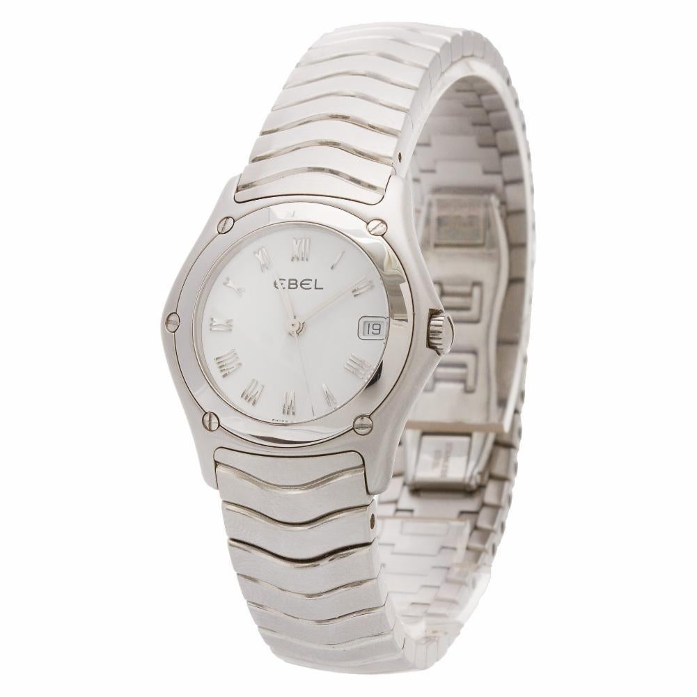 Ladies Ebel Classic Wave in stainless steel. Quartz w/ date. With box. Ref 9087F21. Fine Pre-owned Ebel Watch. Certified preowned Ebel Classic Wave 9087F21 watch is made out of Stainless steel on a Stainless Steel bracelet with a Stainless Steel