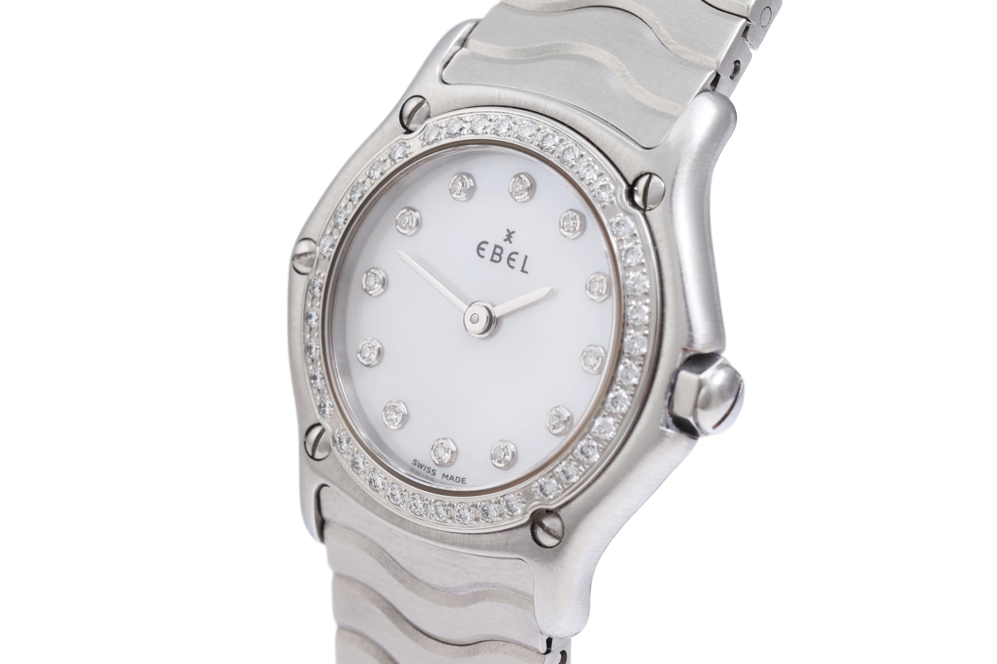 Ebel Classic Wave MOP Dial with Diamond Indexes, Stainless Steel & Diamond Bezel

Movement: Quartz
Condition: Excellent condition
Functions: Hours, minutes
Case: Stainless steel case with 39 diamonds - 5 screws - diameter: 23 mm, thickness: 5,2