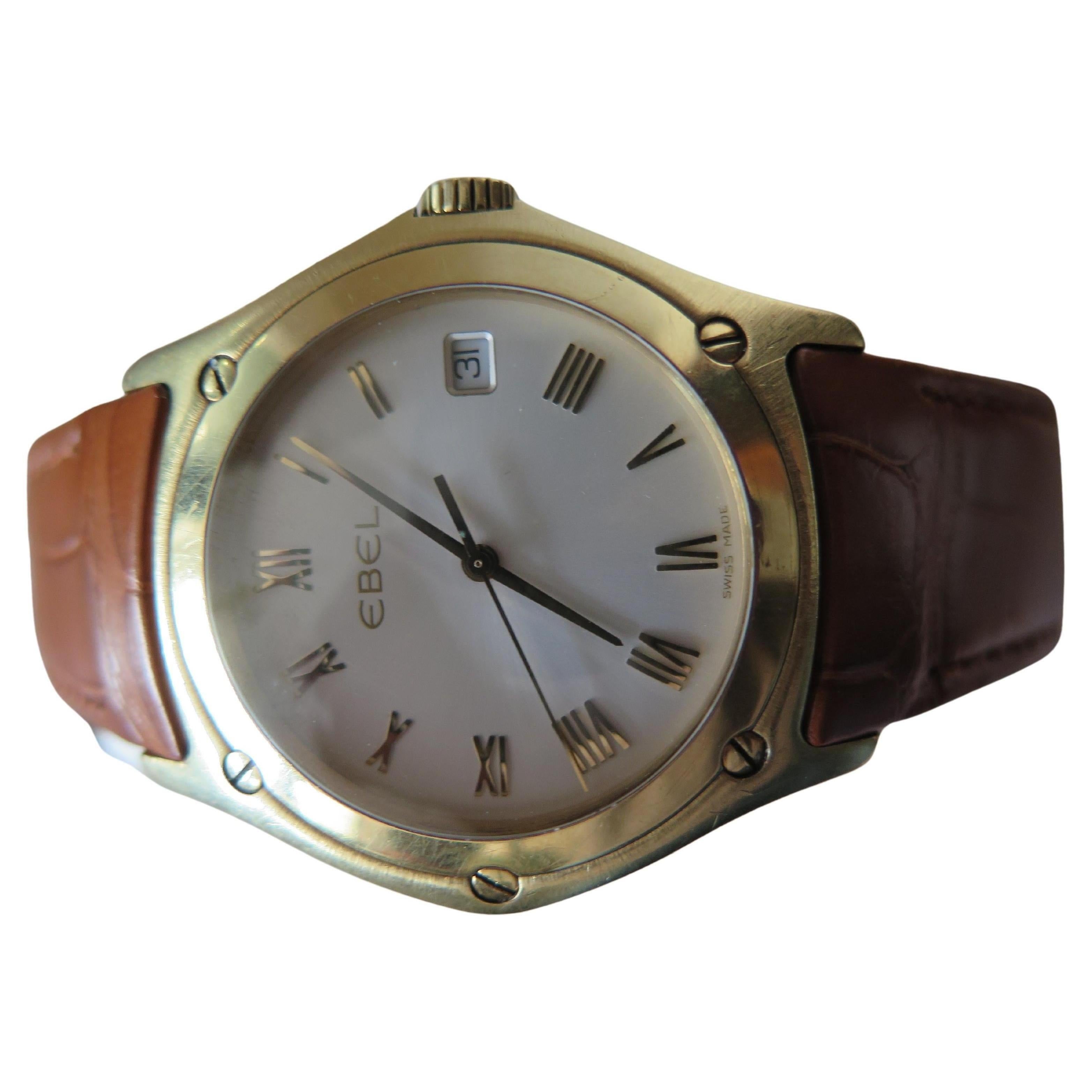 A classic Ebel wave senior watch-large scale version-measuring 38mm wide without crown. Brand new cognac strap ordered from Ebel and fitted with original 18k deployant buckle. Original, unpolished watch, keeping accurate quartz time. Hugs the wrist