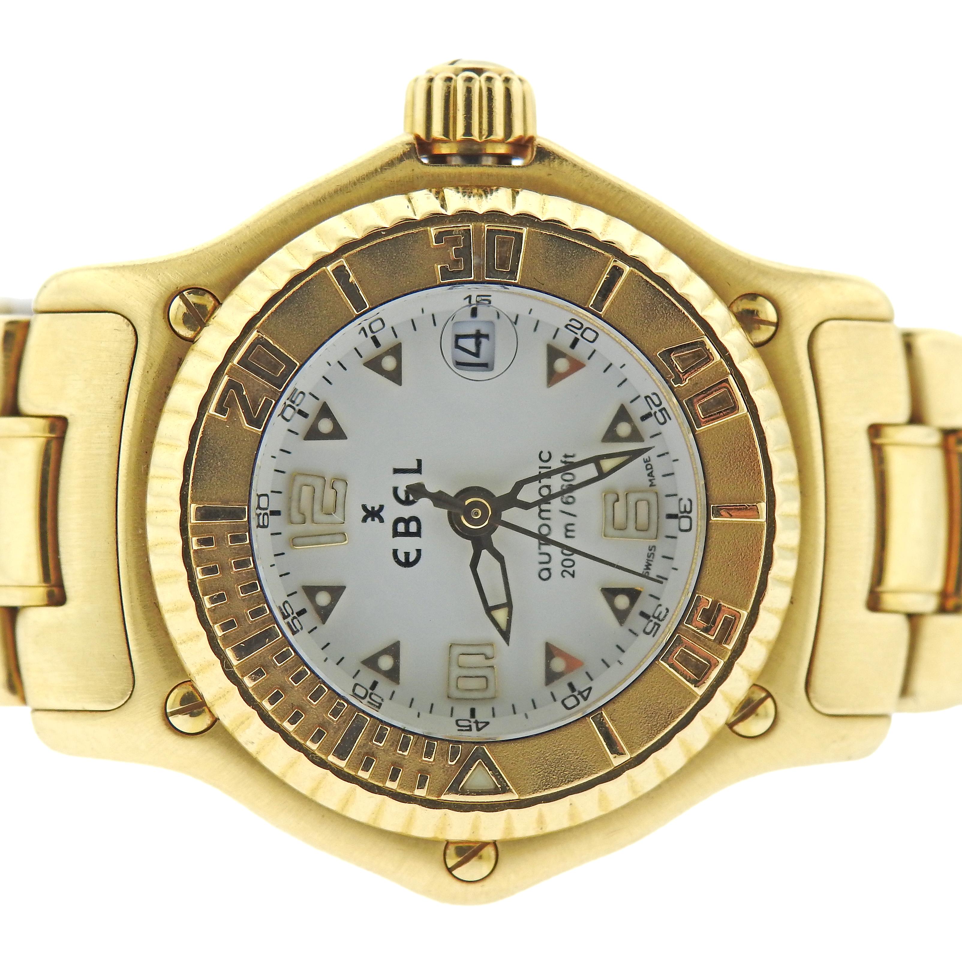 EBEL Discovery Automatic 18k Yellow Gold Lady's Wristwatch

Round-shape case (34 mm including crown) with white EBEL dial, gold triangle markers, and date at 3 o'oclock; 18 karat yellow gold; marked EBEL, Automatic, Water Resistant, 200 m/660 feet,