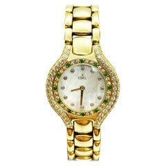 Ebel Ladies Beluga 866940 Diamond Emerald Bezel MOP Dial 18 Karat Yellow Gold