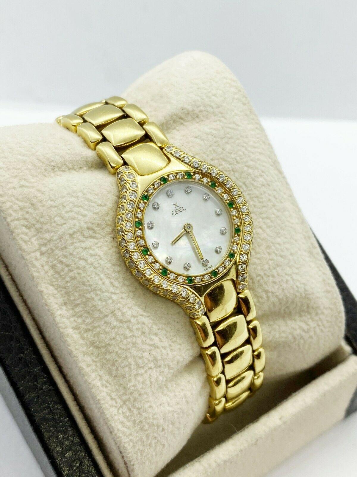 Style Number: 866940

Model: Beluga 

Case Material: 18k Yellow Gold 

Band: 18k Yellow Gold

Bezel:  Diamond Emerald 18K Yellow Gold 

Dial: Mother of Pearl Diamond Dial

Case Size: 24mm

Includes: 
-Elegant Watch Box
-Certified Appraisal 
-1 Year